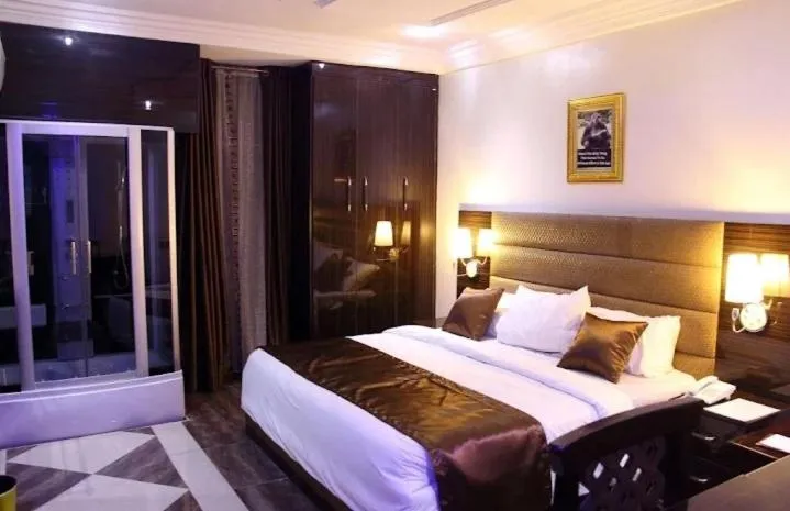Bed in E-Suites Hotel, Abuja