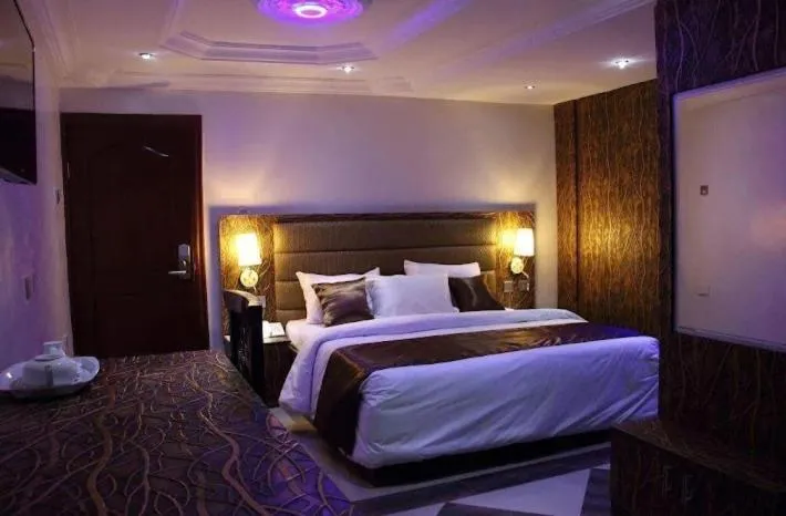 Bed in E-Suites Hotel, Abuja