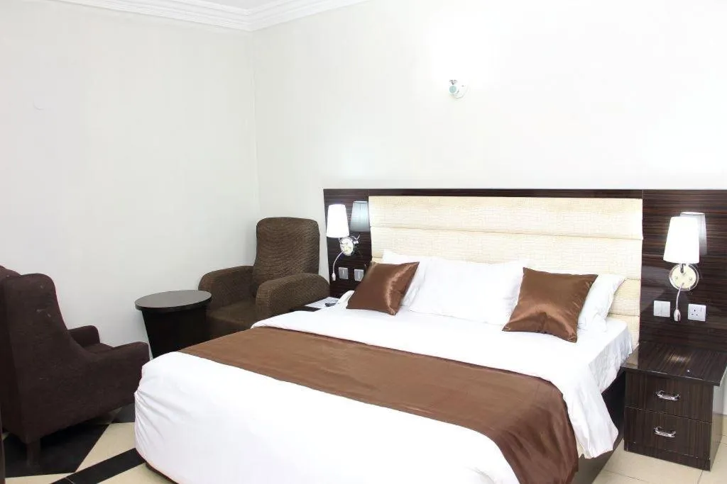 Bed in E-Suites Hotel, Abuja