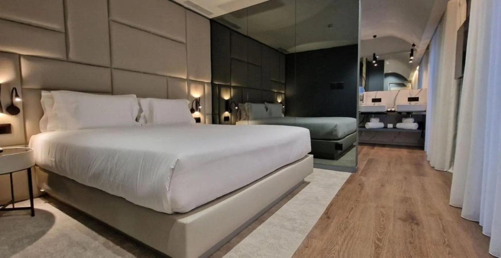 Bed in Bom Sucesso Hotel by gaiarooms
