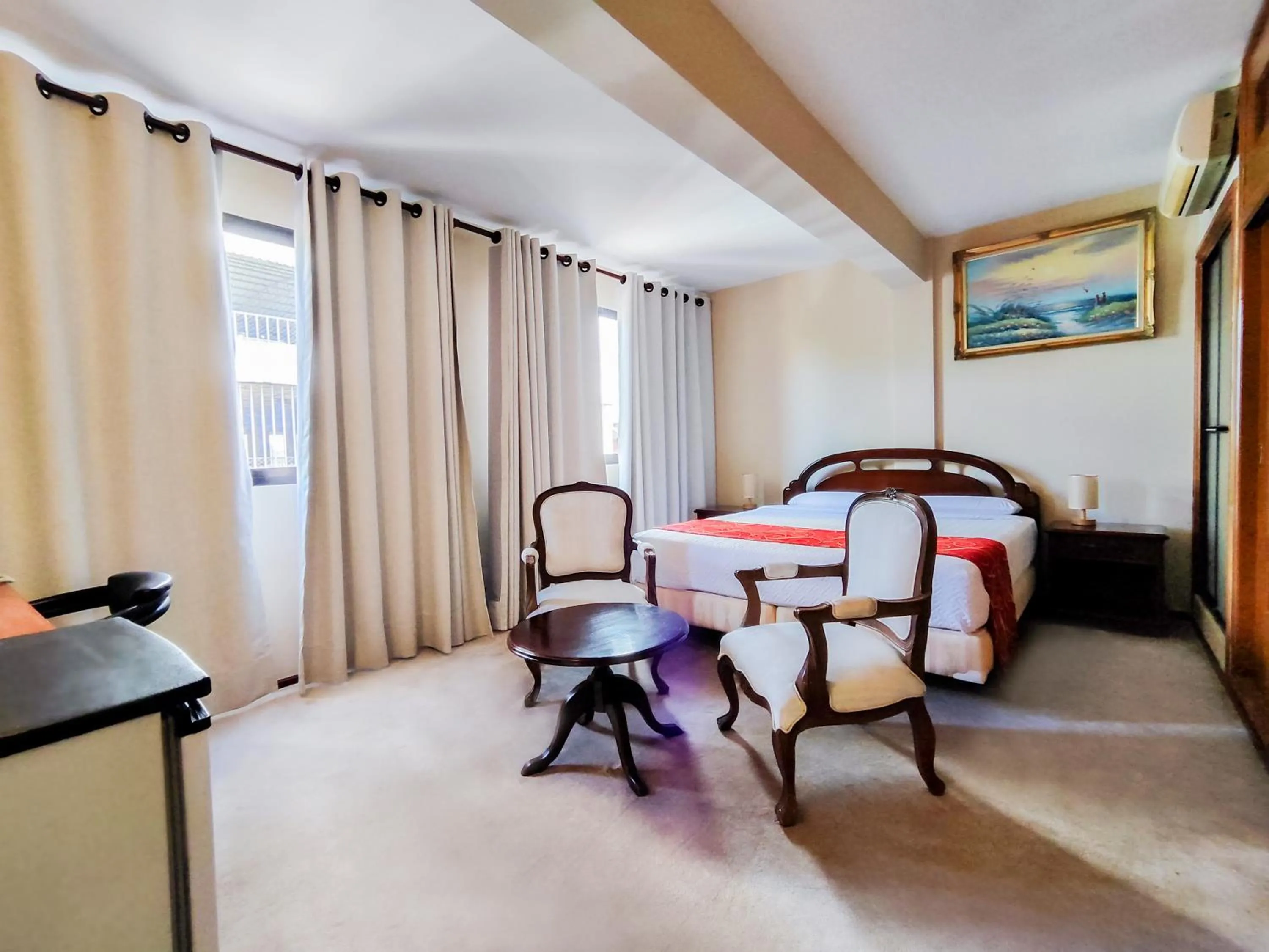 Seating area, Bed in Lido Hotel