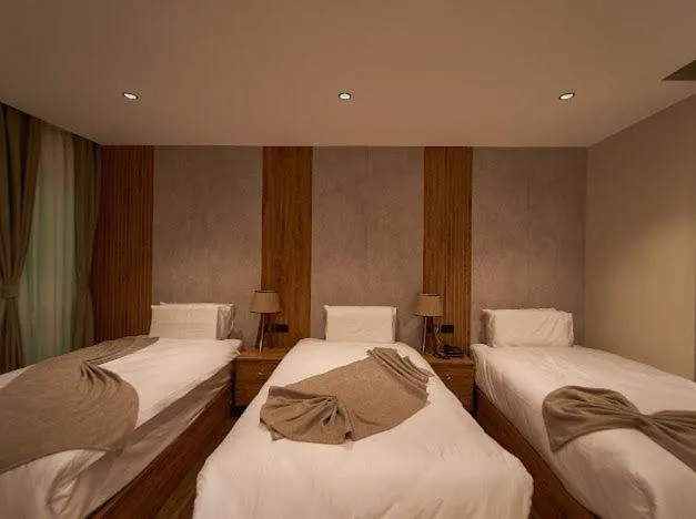 Bed in Gold's Pyramids Hotel