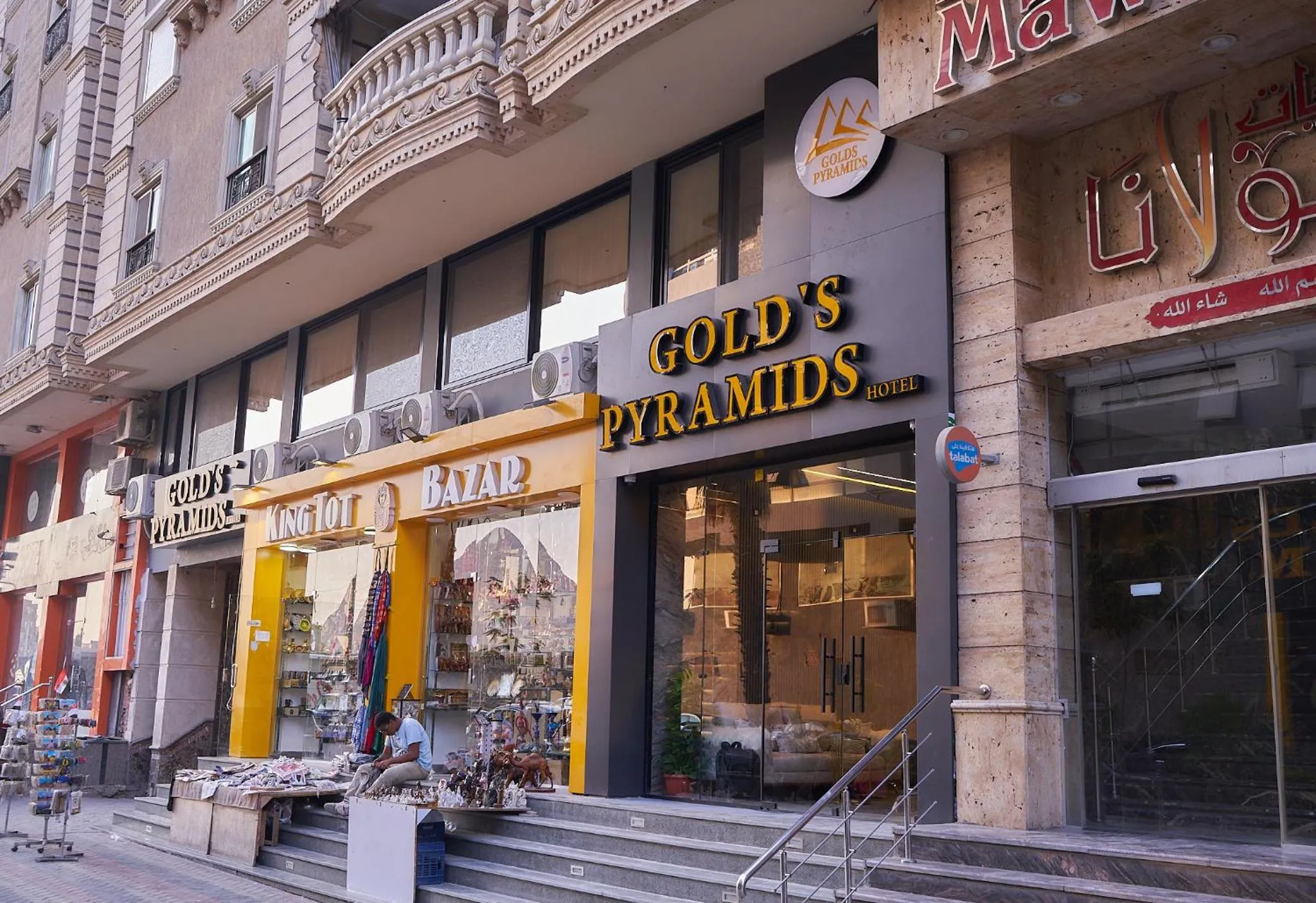 Day in Gold's Pyramids Hotel