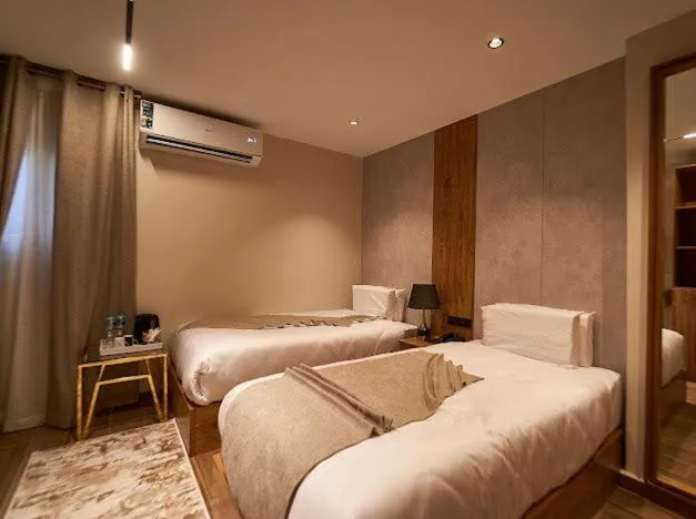 Bed in Gold's Pyramids Hotel