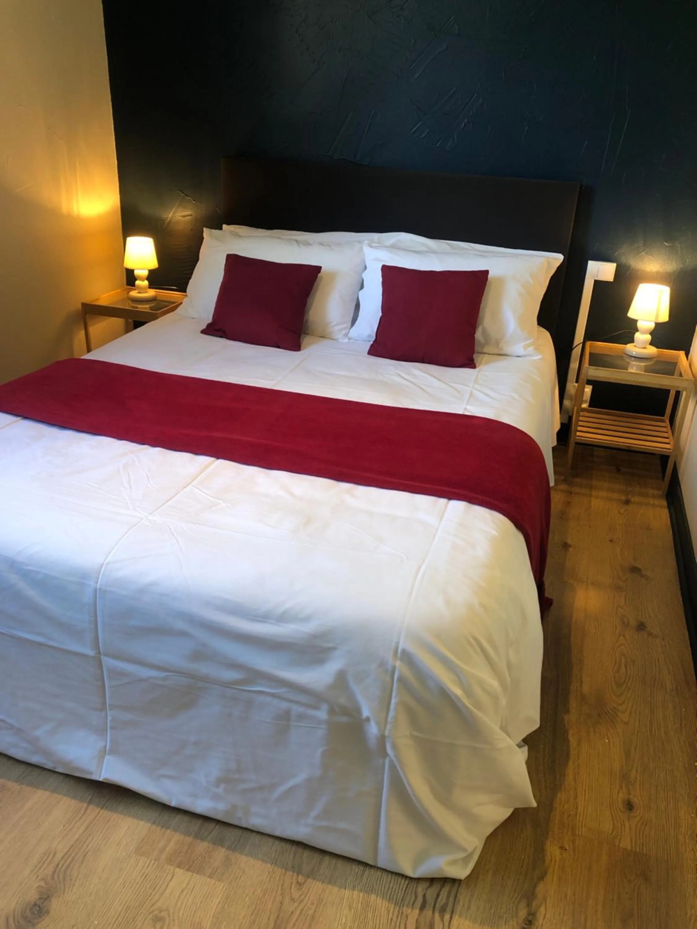Bed in CONTACT HOTEL LE BOIS SAUVAGE