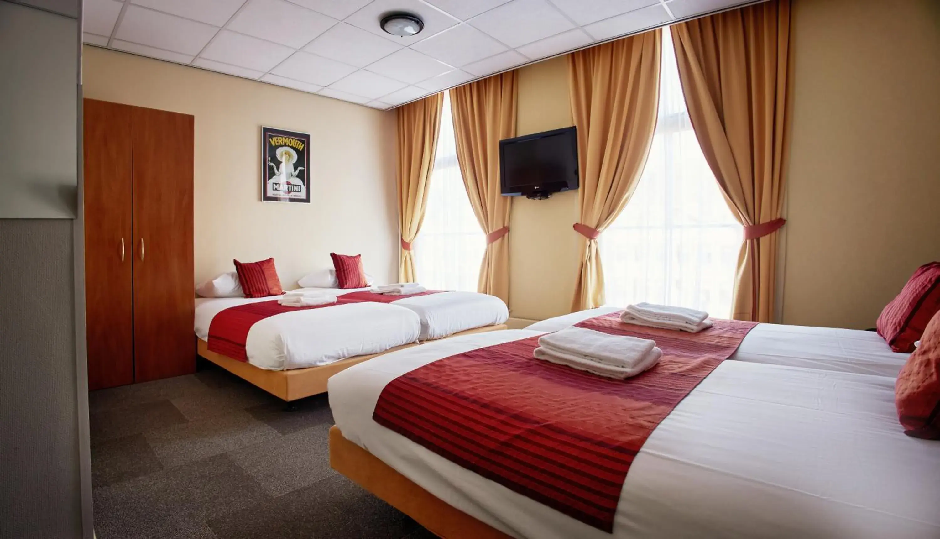 Economy Quadruple Room in Martini Hotel Economy Quadruple Room in Martini Hotel