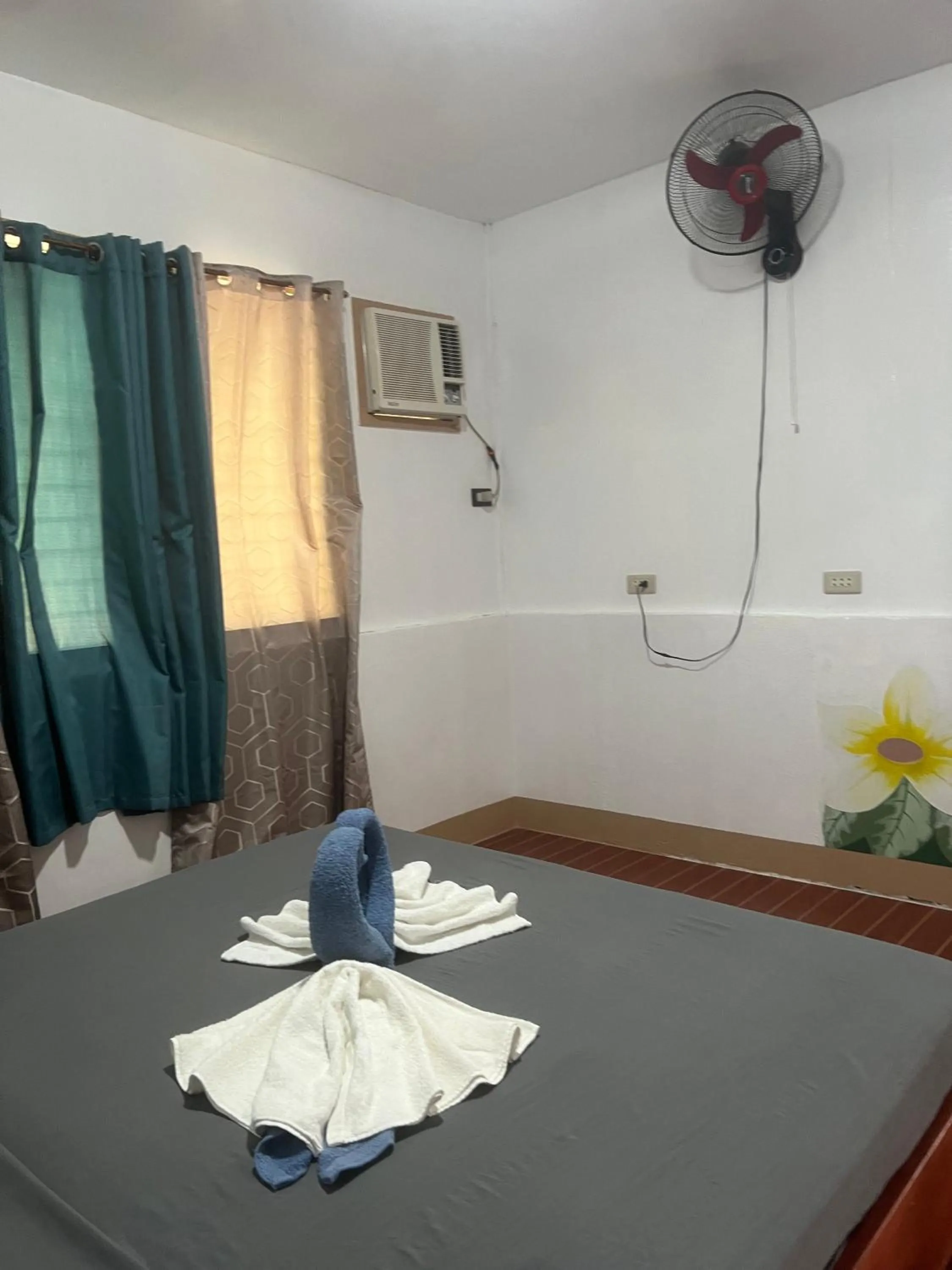 Bed in Gratum Beach Resort