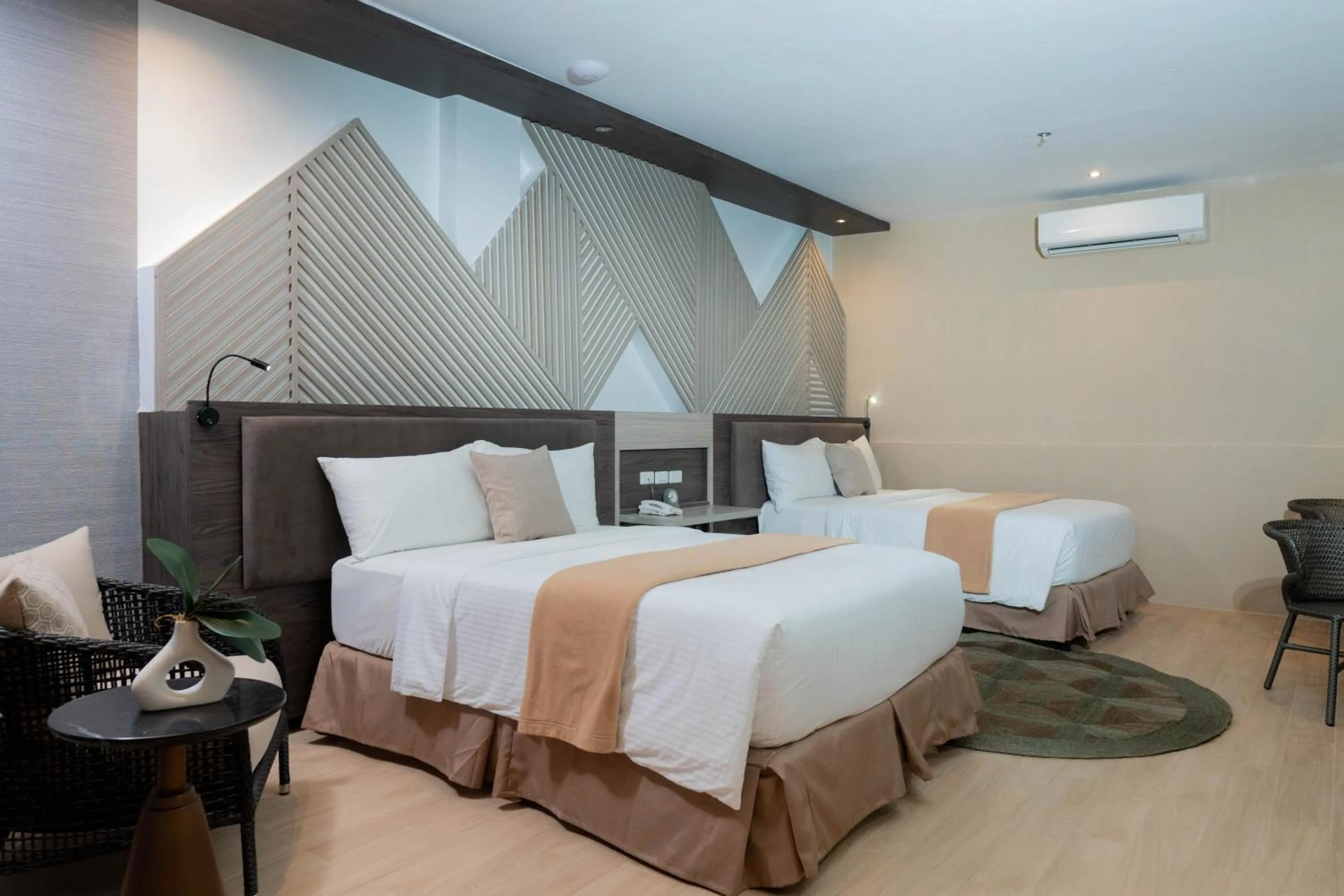 Bed in Adelina Hotel and Suites