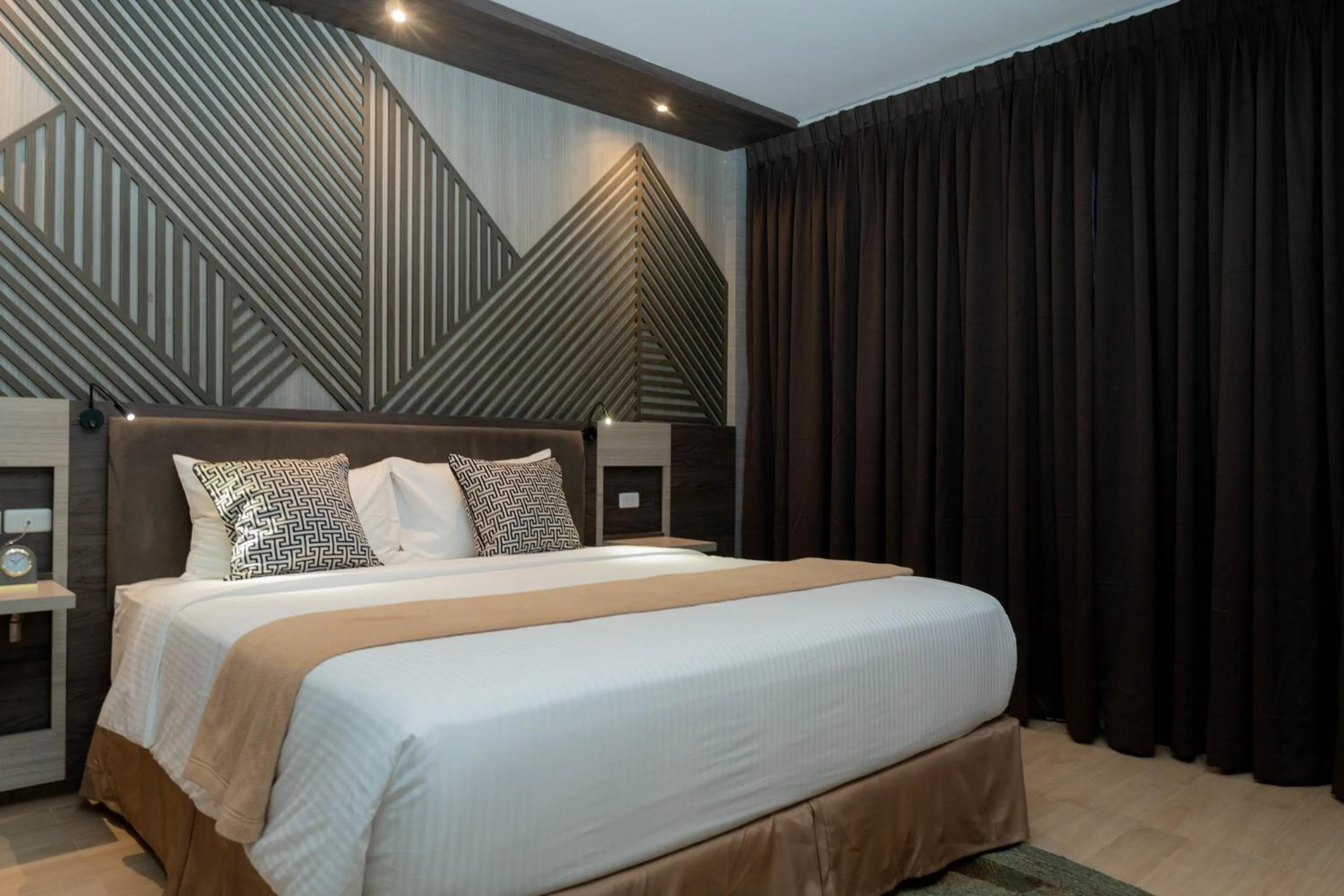 Bed in Adelina Hotel and Suites