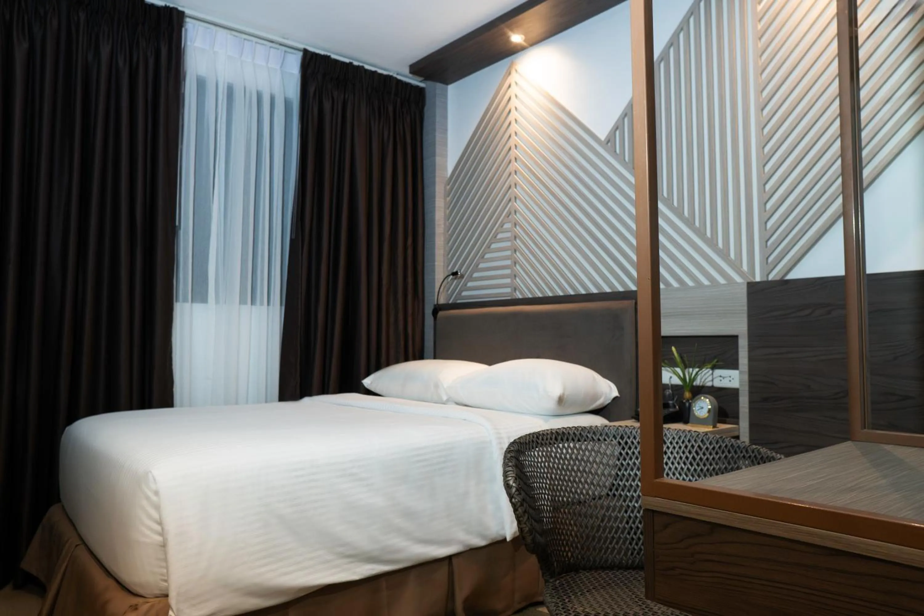 Bed in Adelina Hotel and Suites