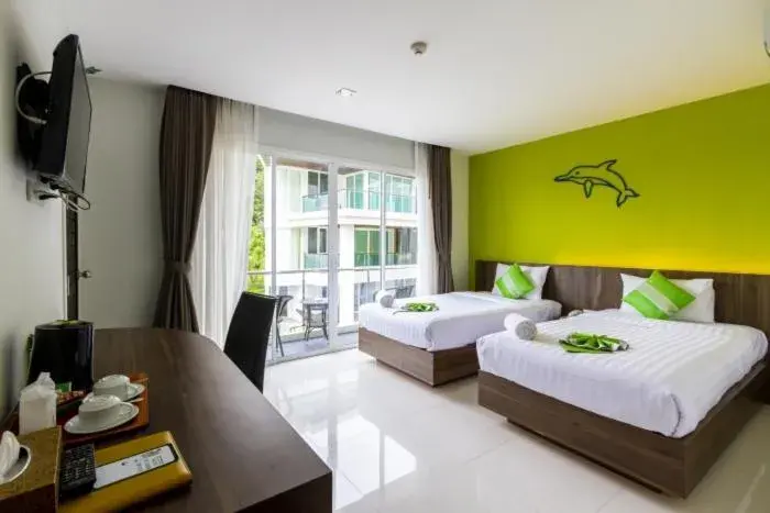 Deluxe Quadruple Room in DIPANTAI BOUTIQUE BEACH RESORT Deluxe Quadruple Room in DIPANTAI BOUTIQUE BEACH RESORT