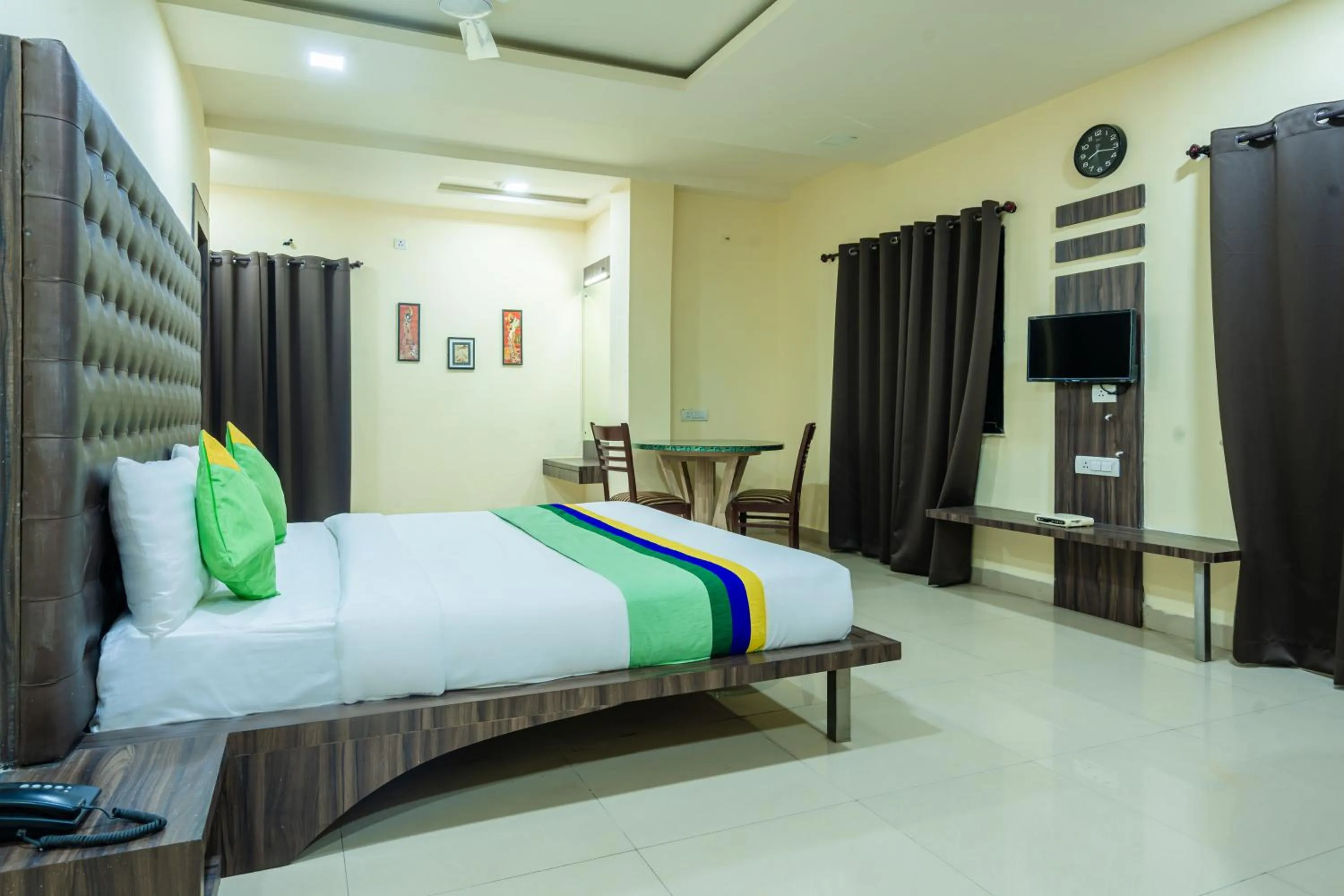 Bedroom, Bed in Treebo Udyam Glory