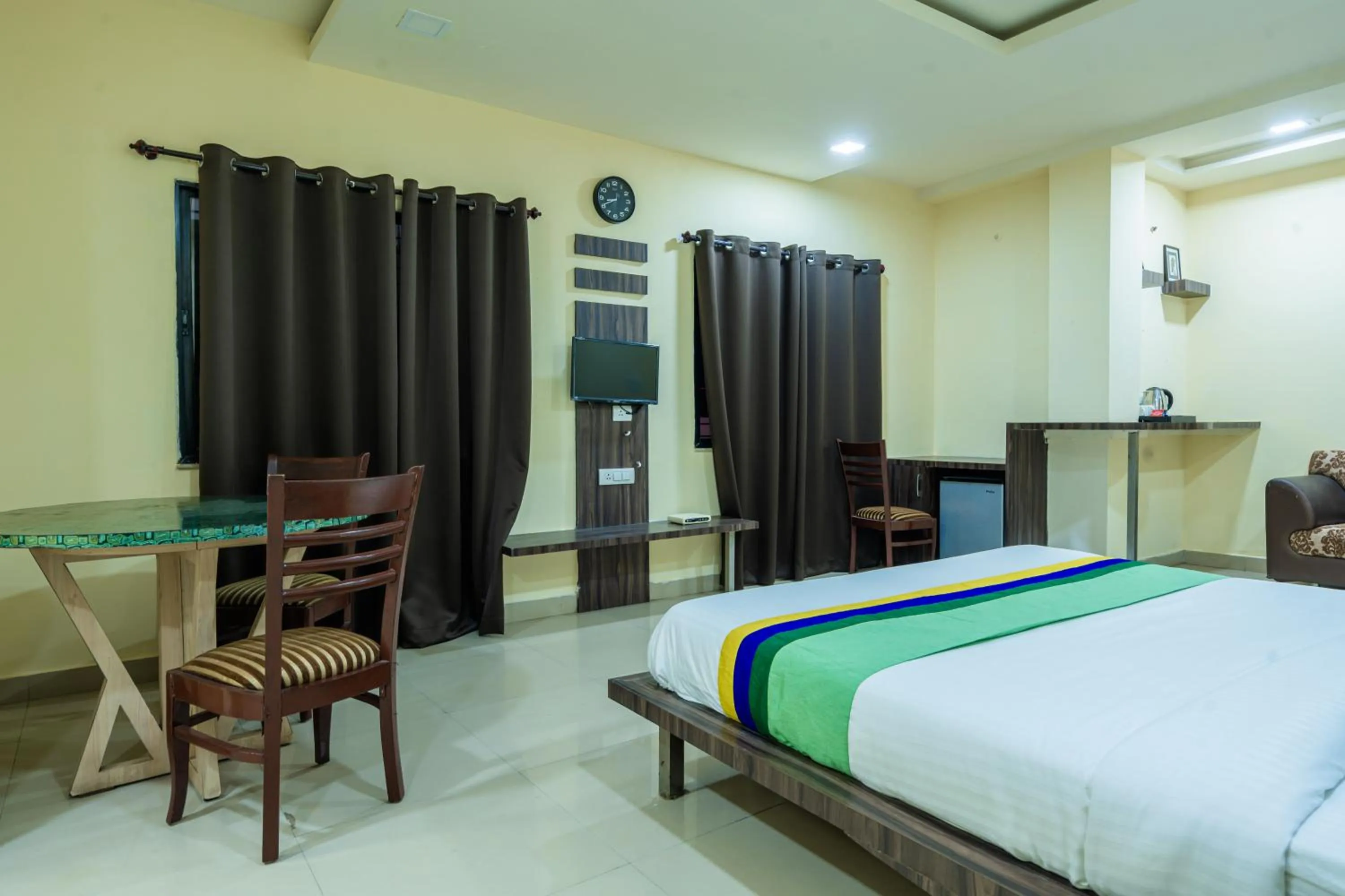 Bedroom, Bed in Treebo Udyam Glory