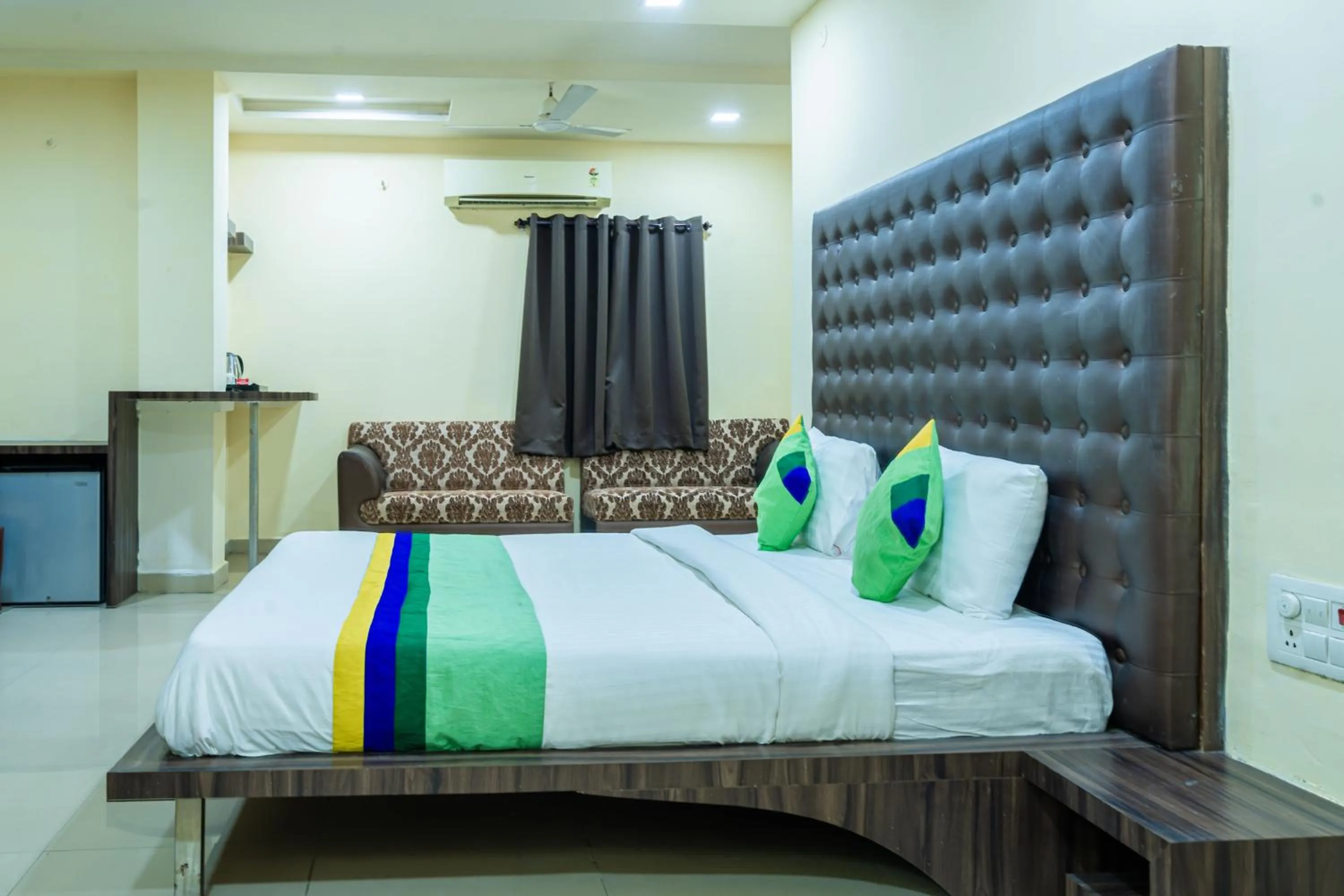 Bedroom, Bed in Treebo Udyam Glory