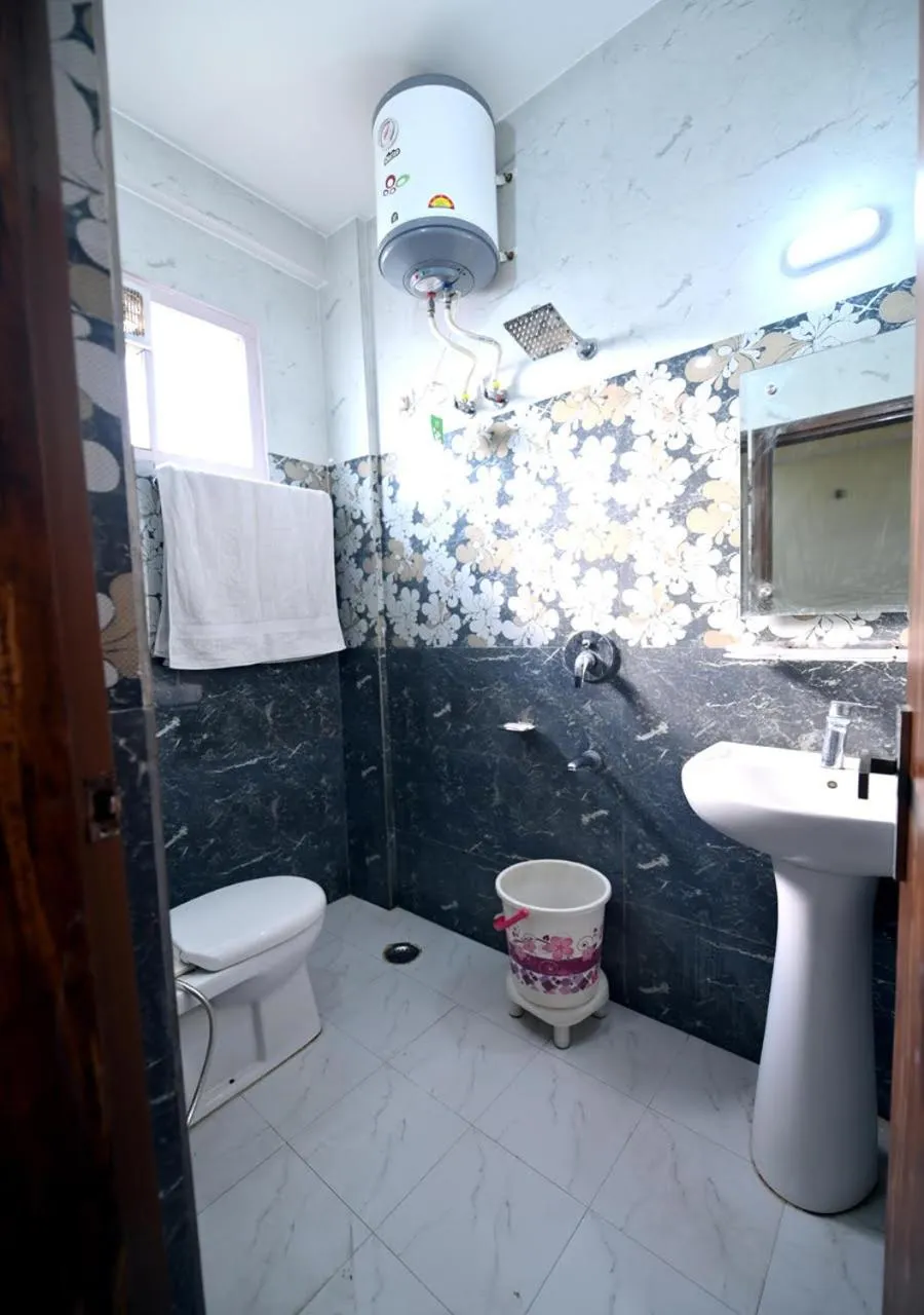 Bathroom in Royal Inn Jammu
