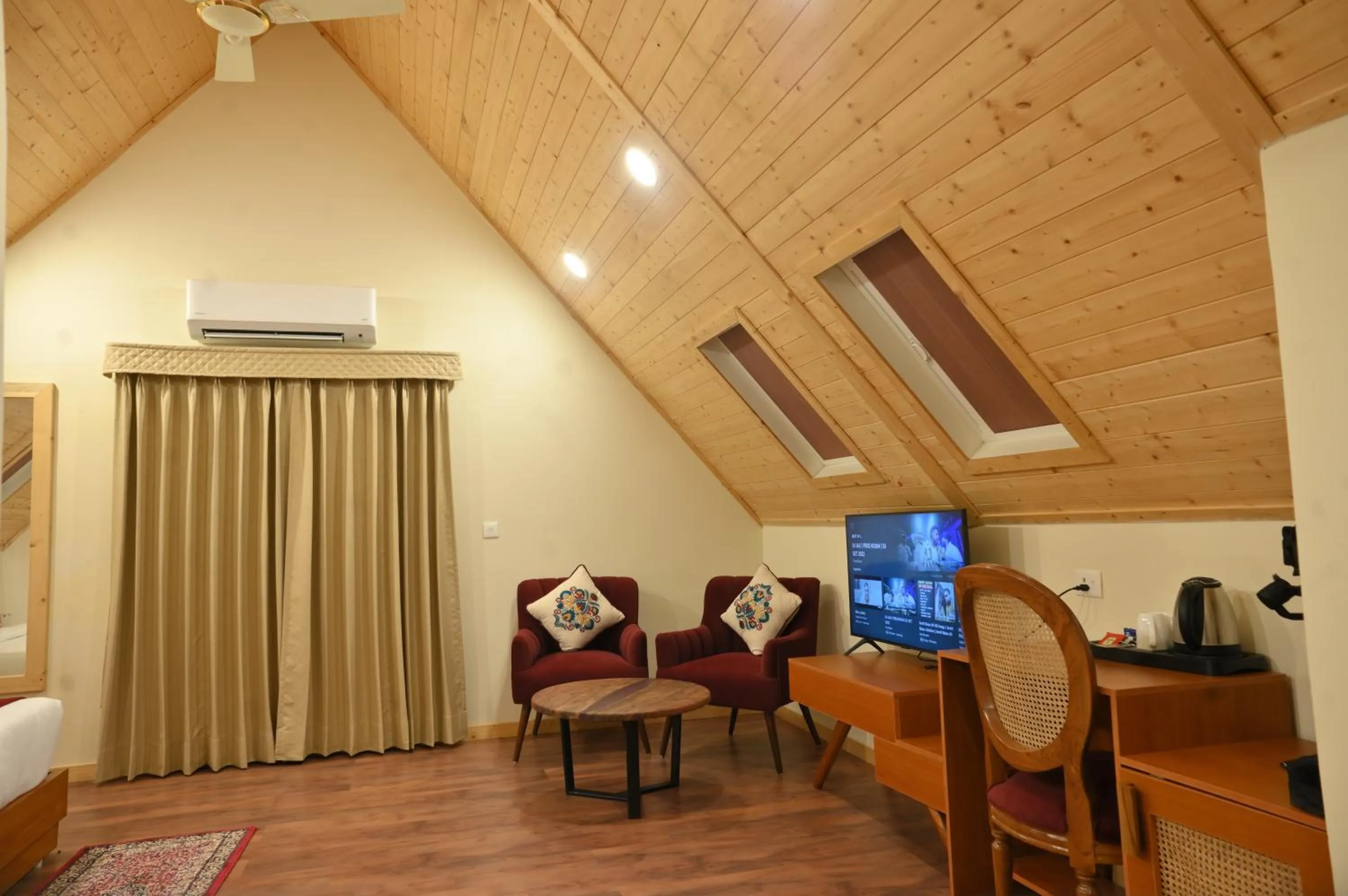 Seating area in Samsara Luxury Cottages & Spa, Chail Hills