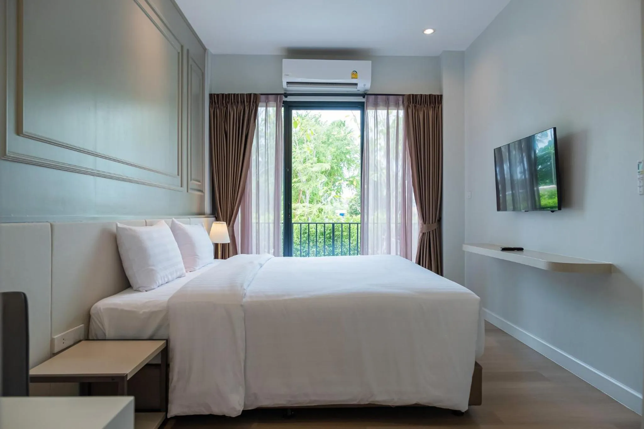 Bed in Wellington Hotel Prachuapkhirikhan