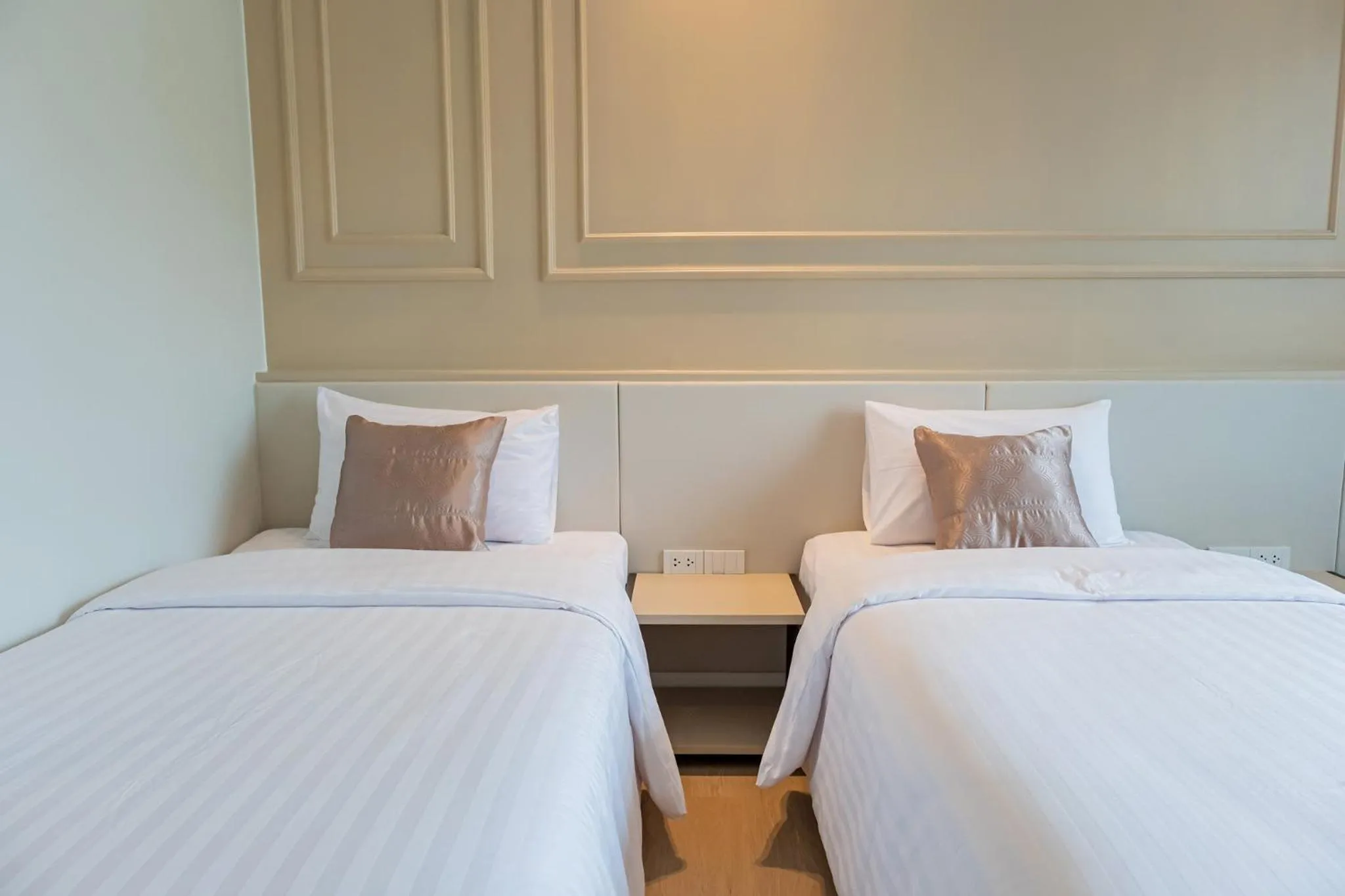 Bed in Wellington Hotel Prachuapkhirikhan