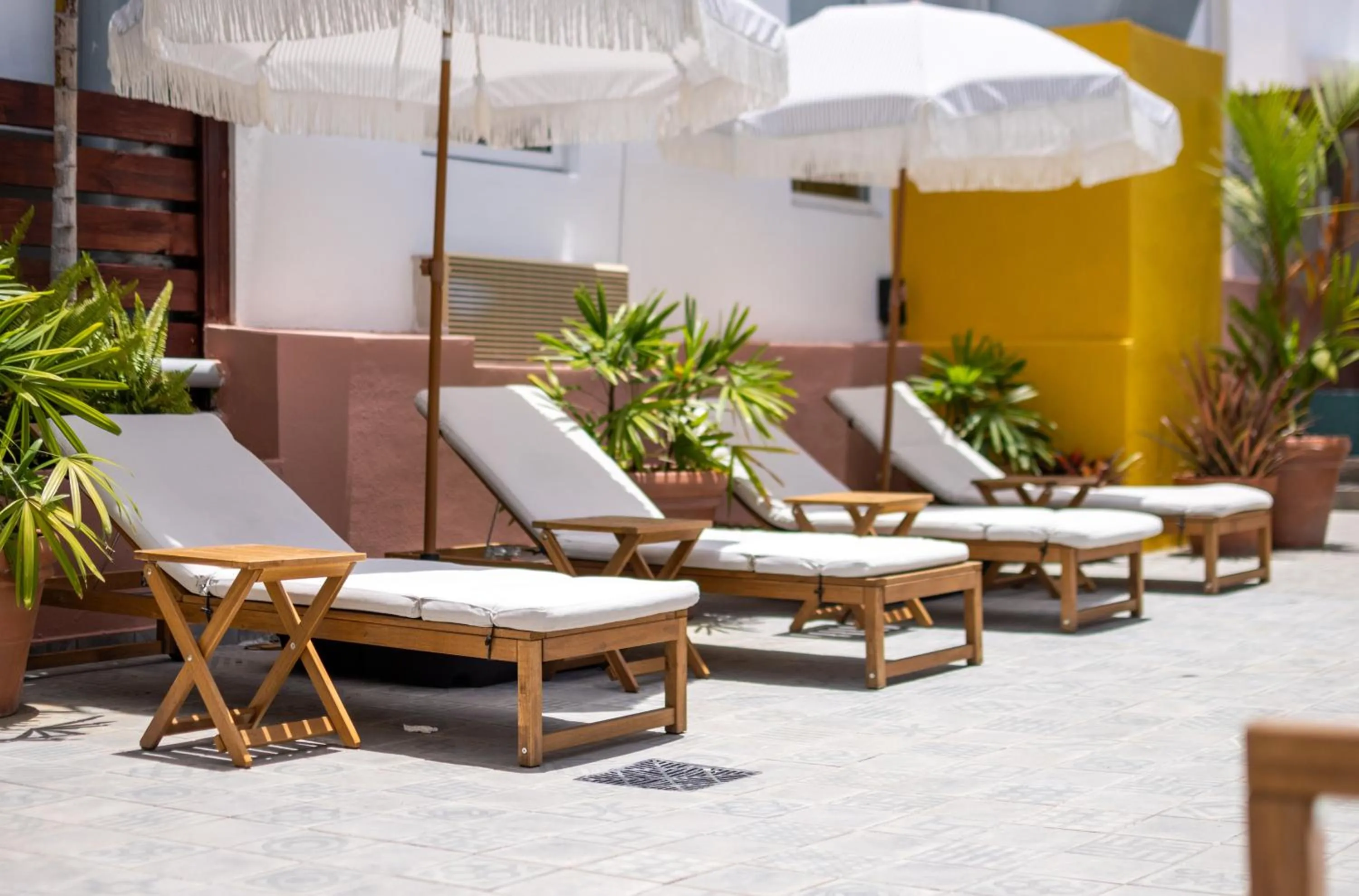 sunbed in La Mona Loiza Apartment Complex by Stay with Bear