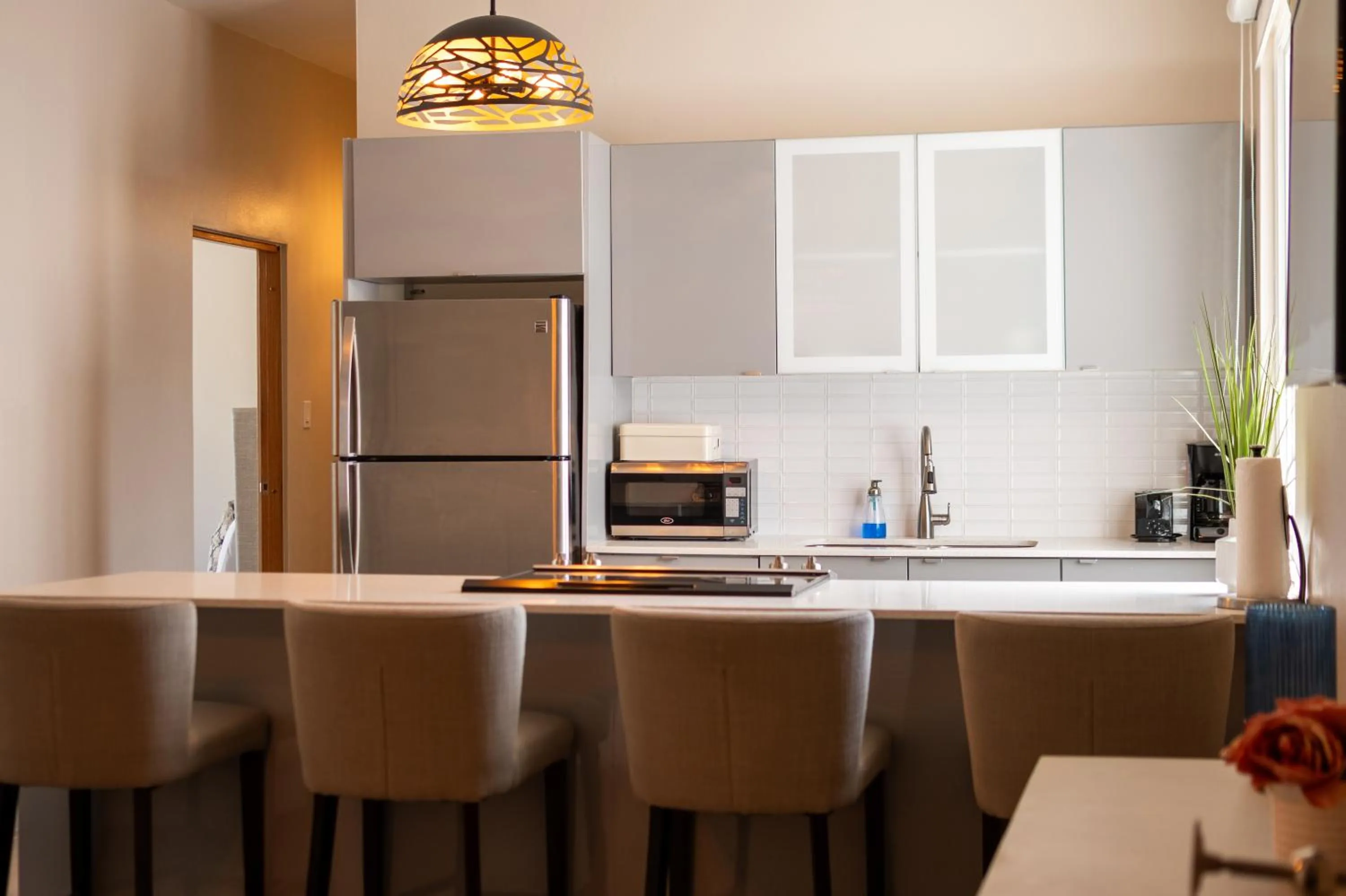 Kitchen or kitchenette in La Mona Loiza Apartment Complex by Stay with Bear