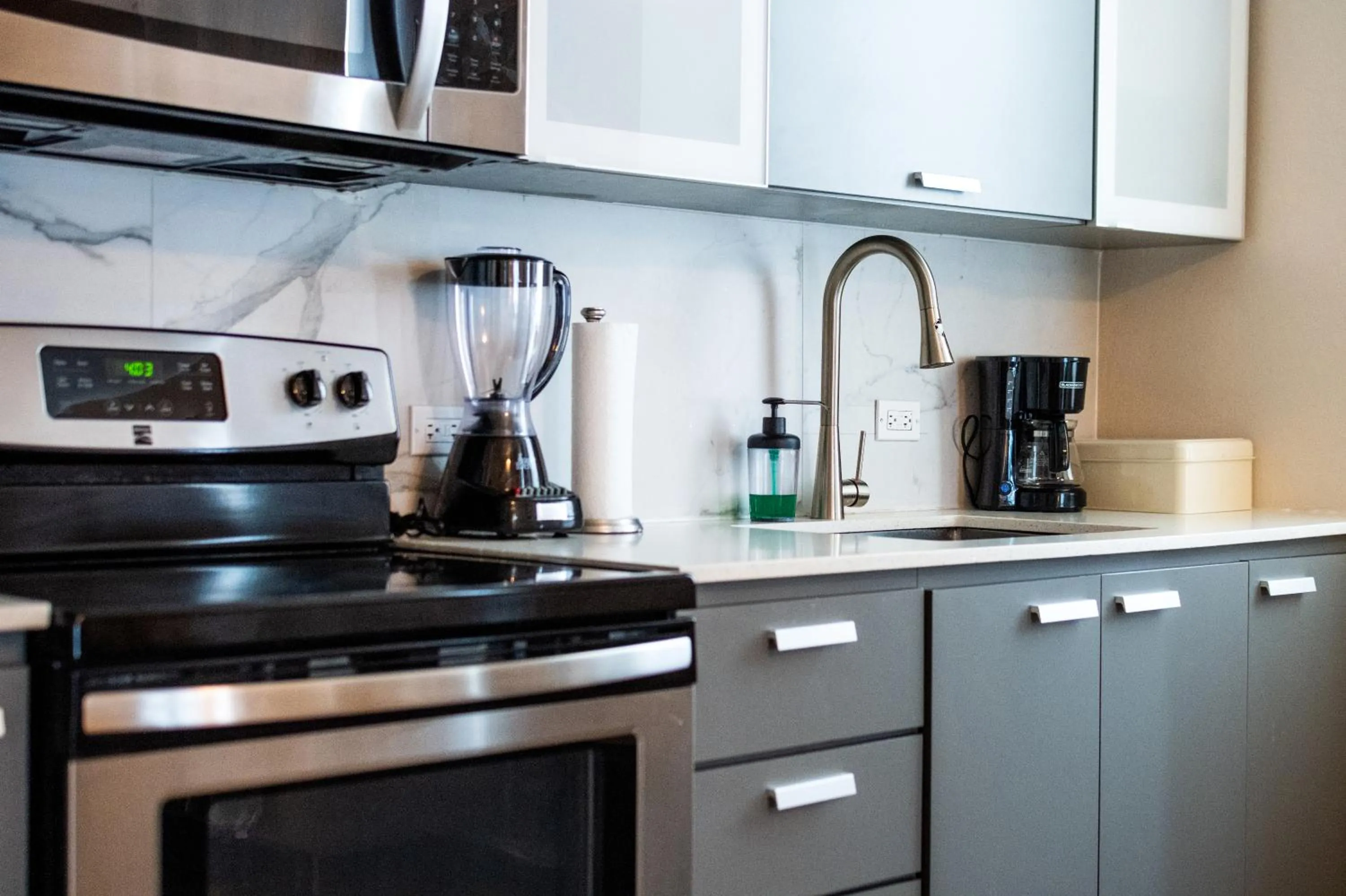 Kitchen or kitchenette in La Mona Loiza Apartment Complex by Stay with Bear