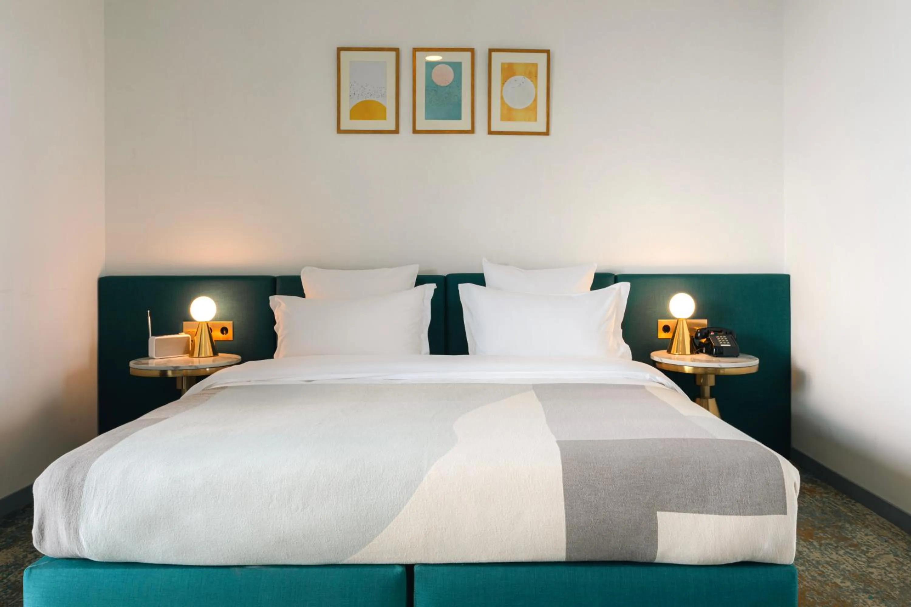 Bed in Castor & Pollux Hotel