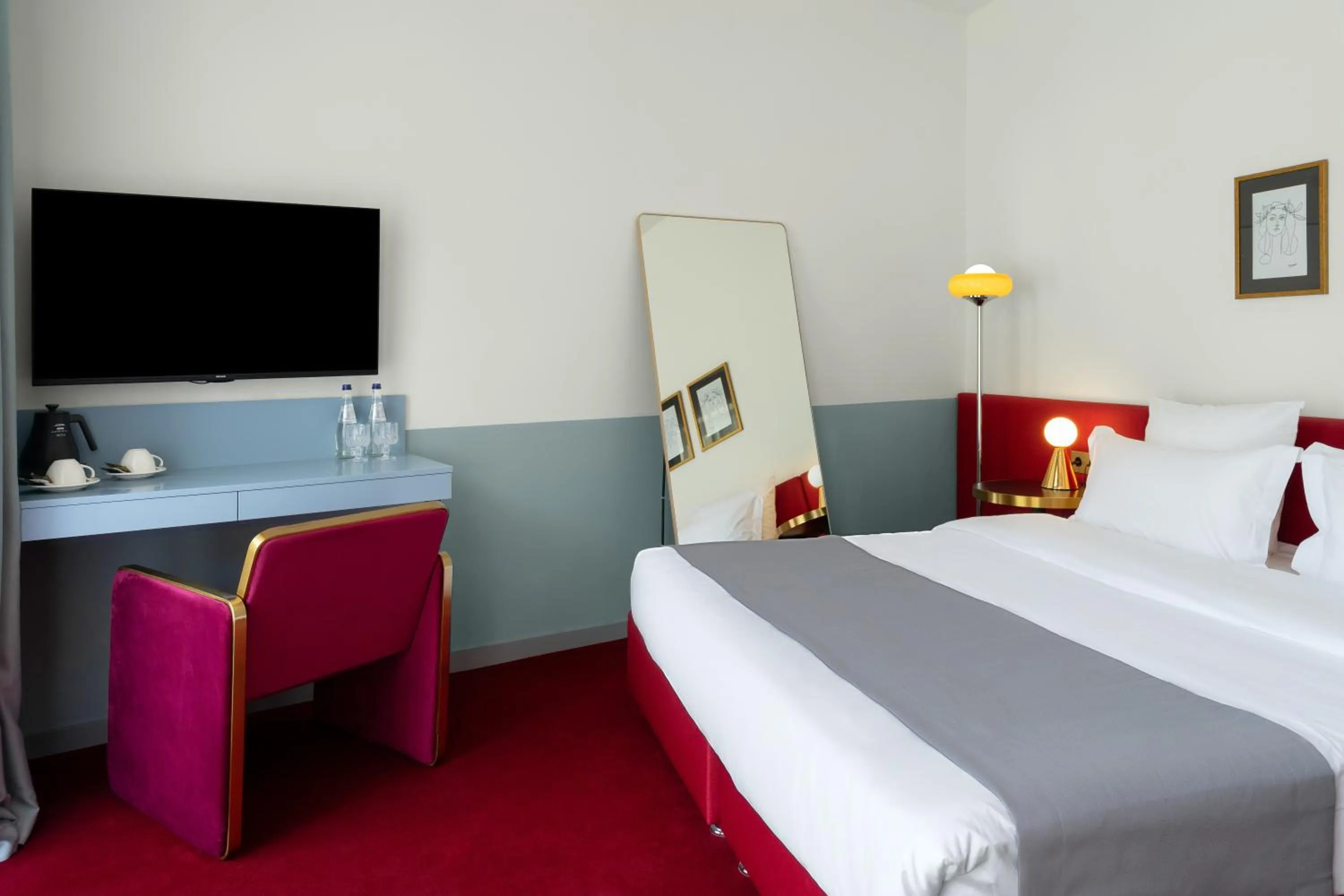 Bed in Castor & Pollux Hotel