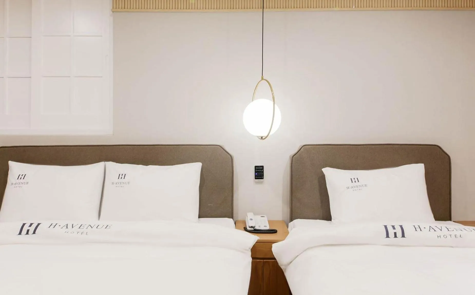 Bed in H Avenue Hotel in Gyeongju