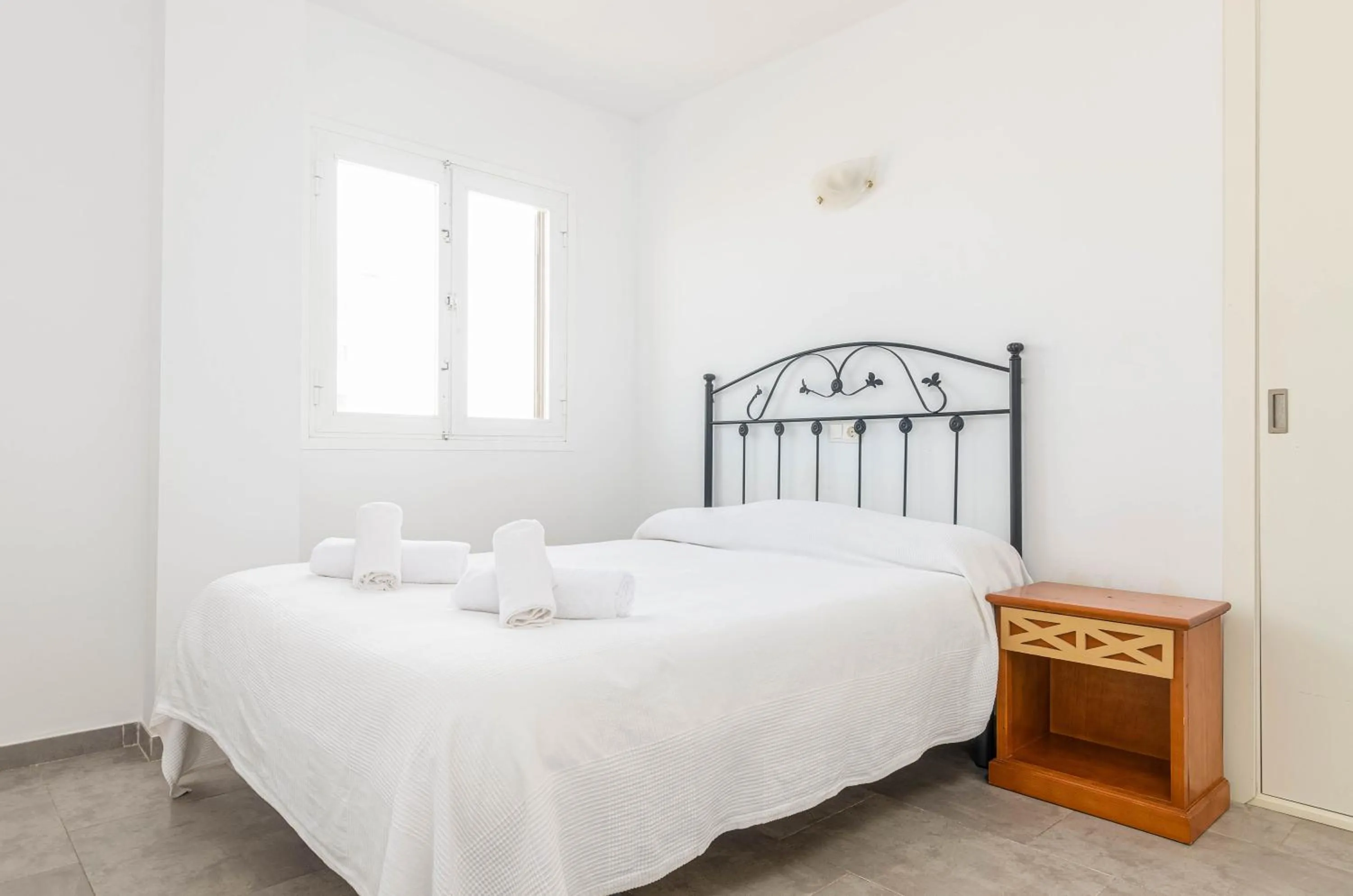 Bed in Acapulco Apartments