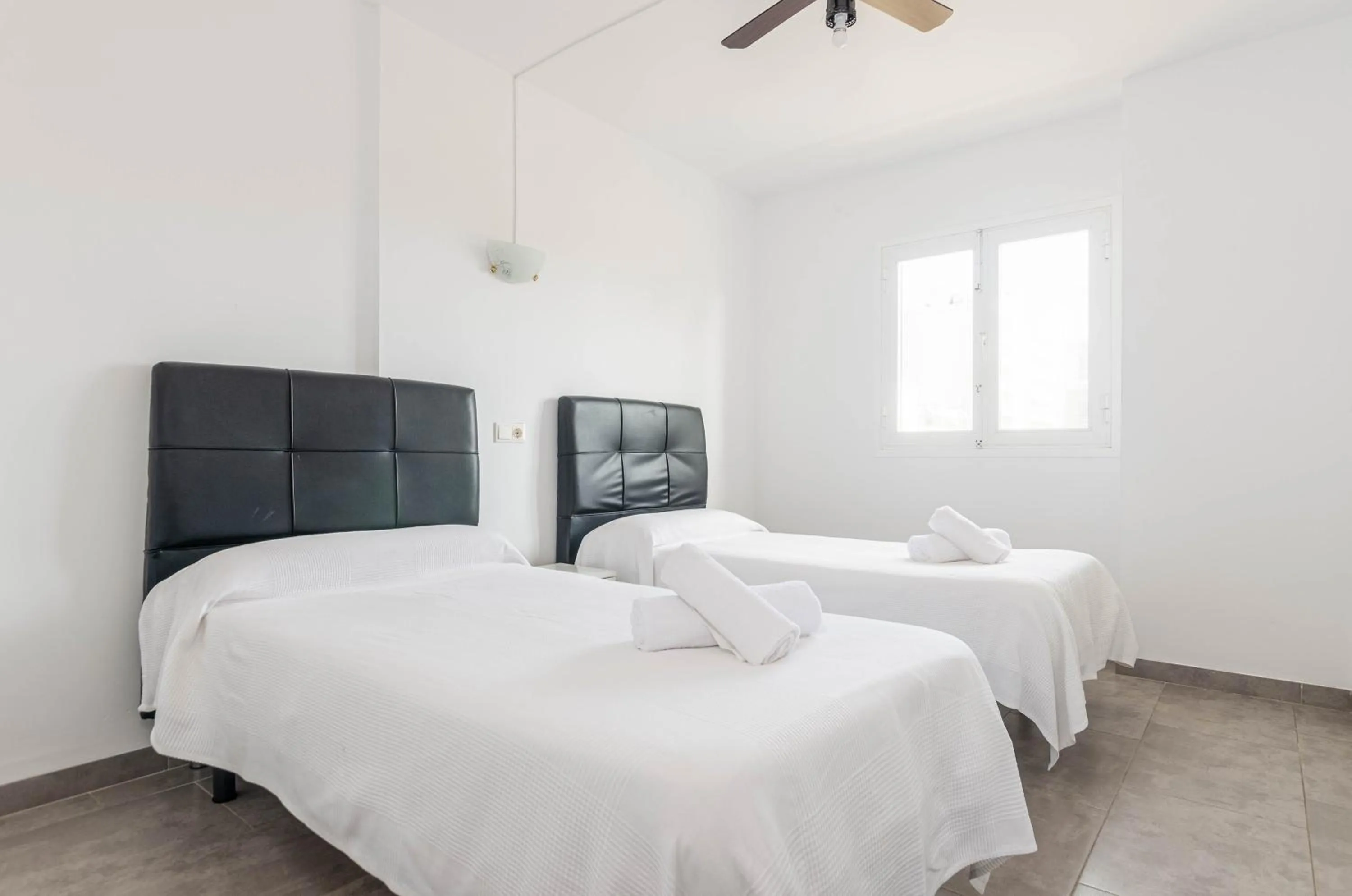 Bed in Acapulco Apartments