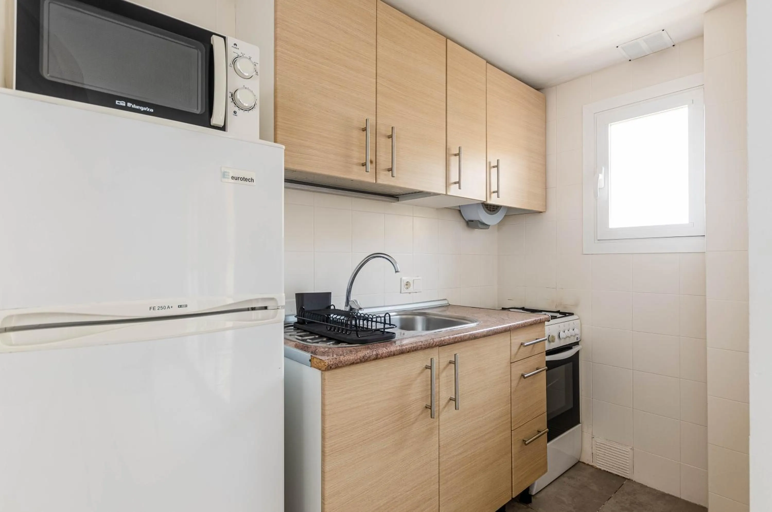 Kitchen or kitchenette in Acapulco Apartments