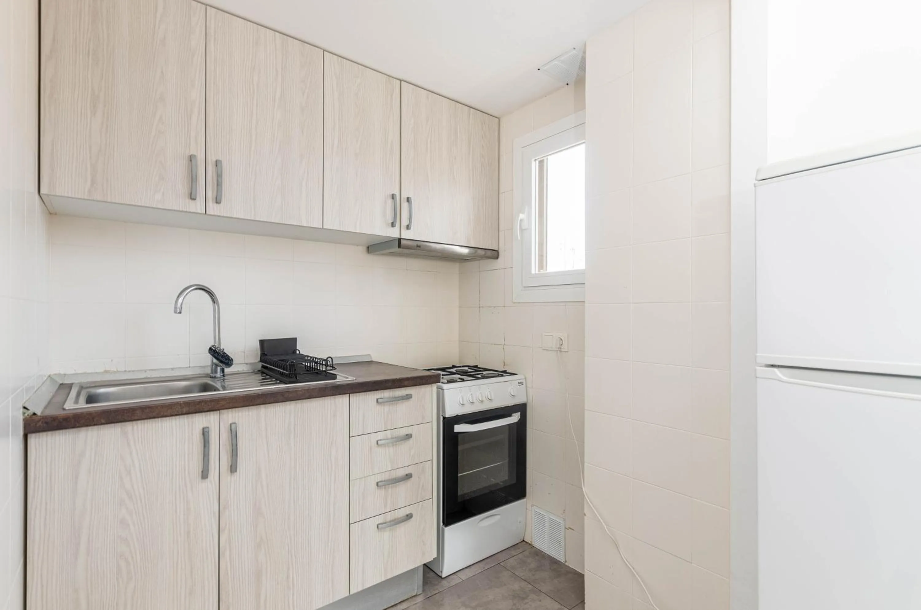 kitchen in Acapulco Apartments