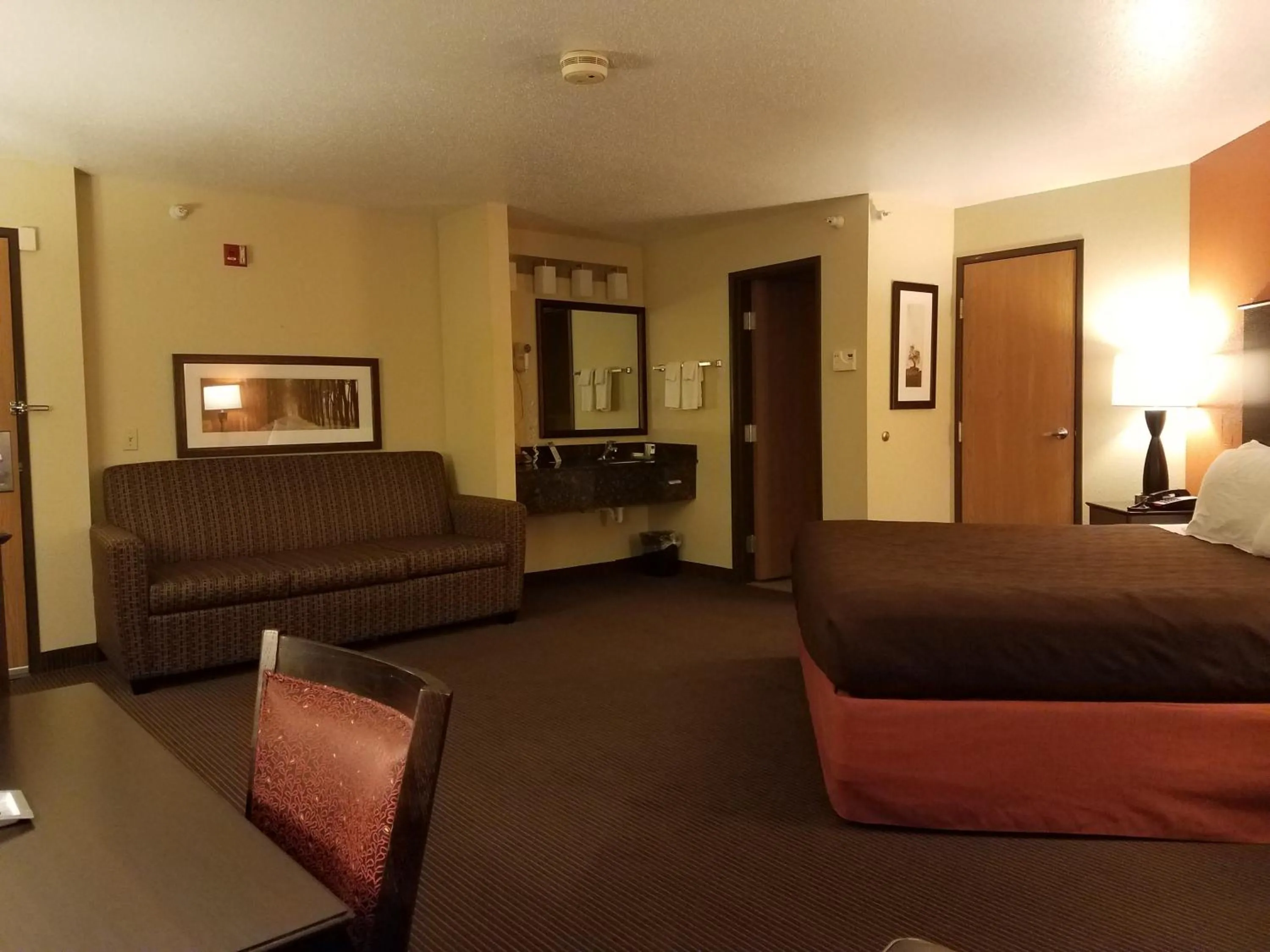 Bedroom, Bed in AmericInn by Wyndham Menomonie