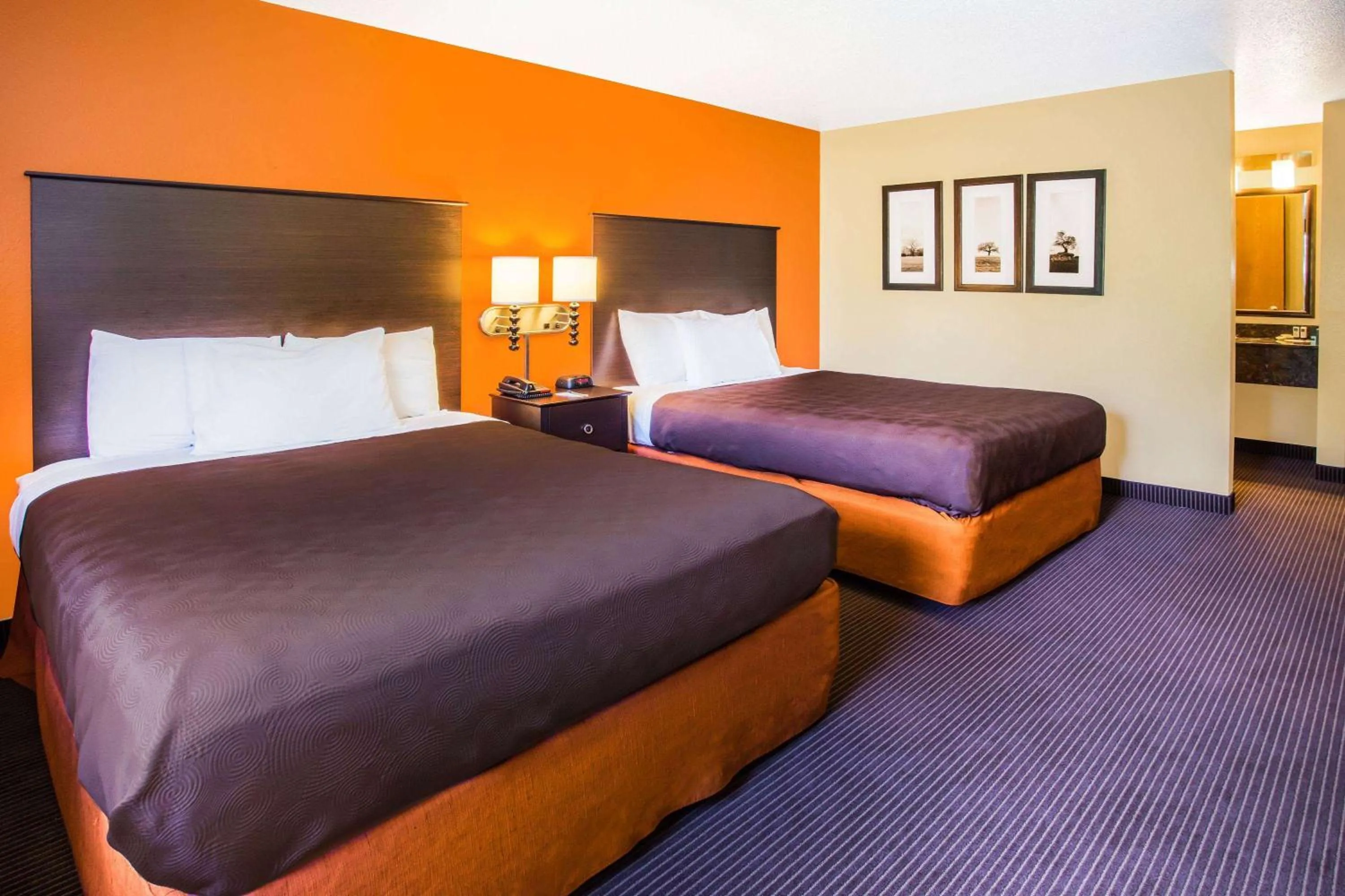 Photo of the whole room, Bed in AmericInn by Wyndham Menomonie