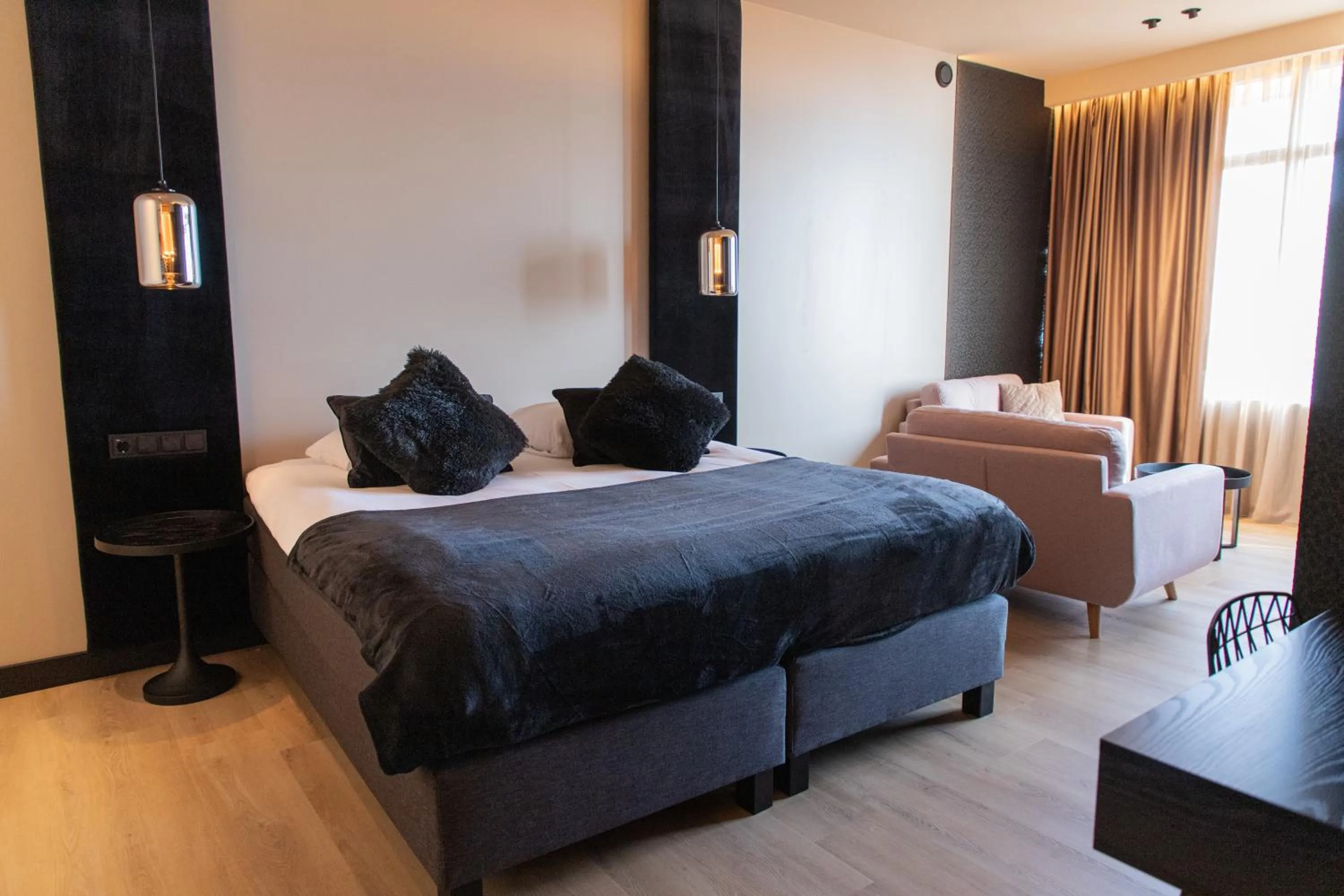 Living room, Bed in Palace Hotel Zandvoort