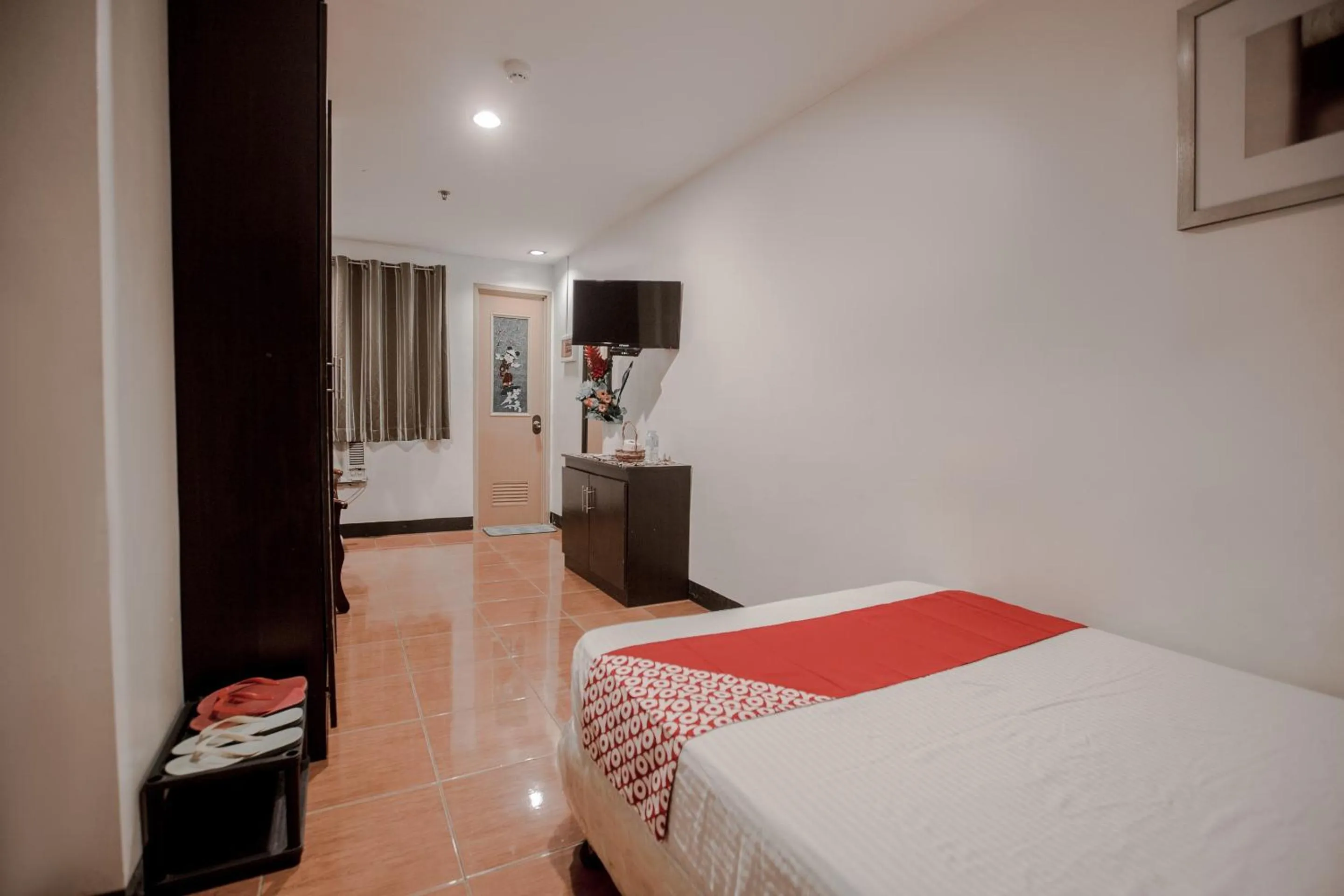 Bedroom, Bed in Super OYO 714 Haeinsa Condotel