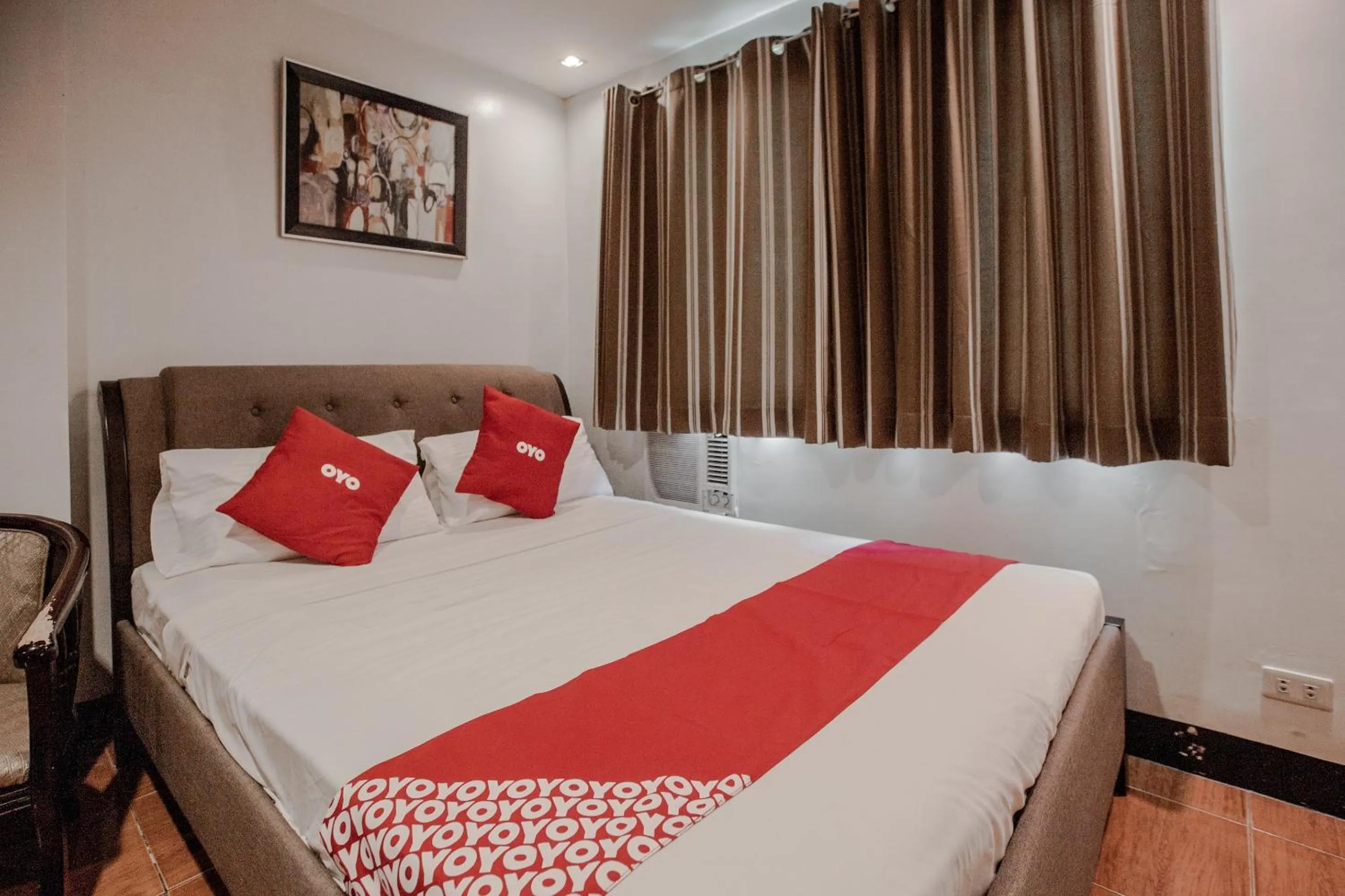 Bedroom, Bed in Super OYO 714 Haeinsa Condotel