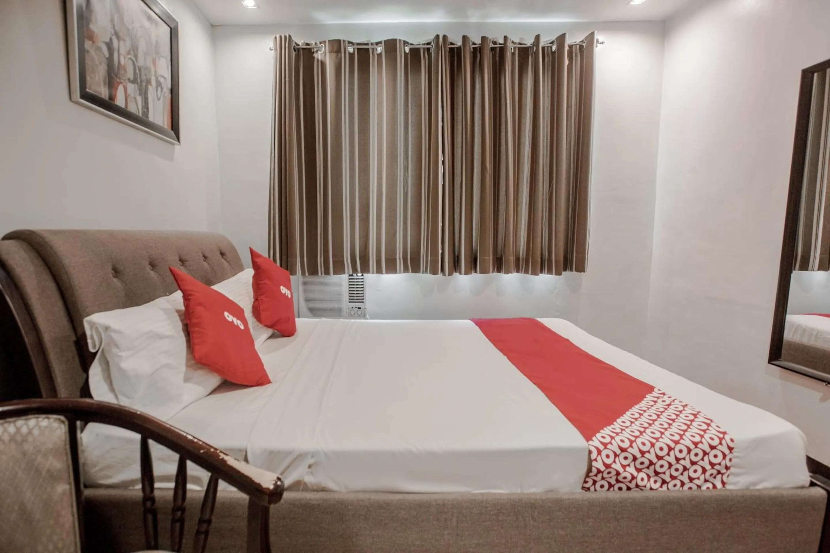 Bedroom, Bed in Super OYO 714 Haeinsa Condotel