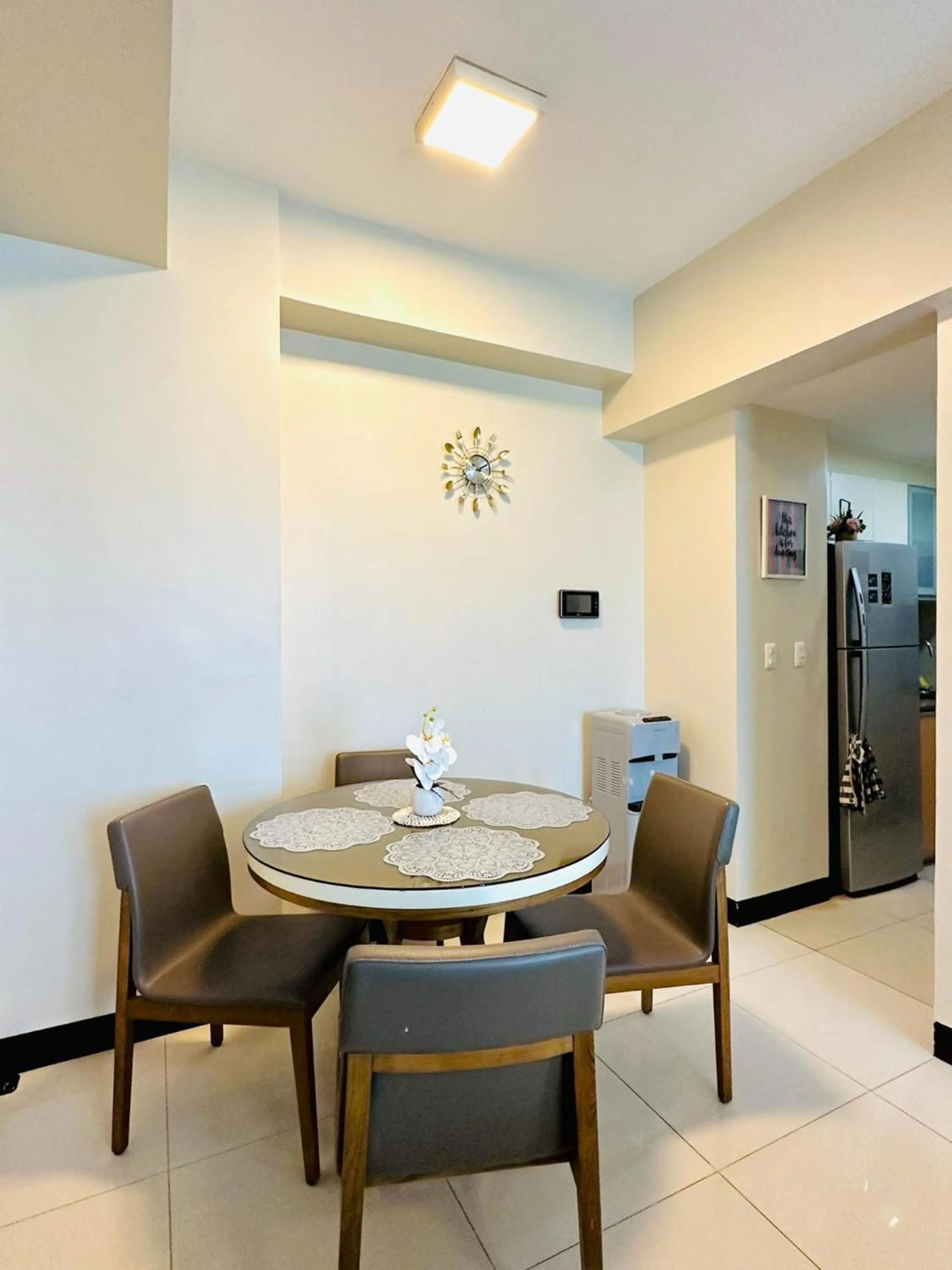 Dining area in One Manchester Place by Hiverooms