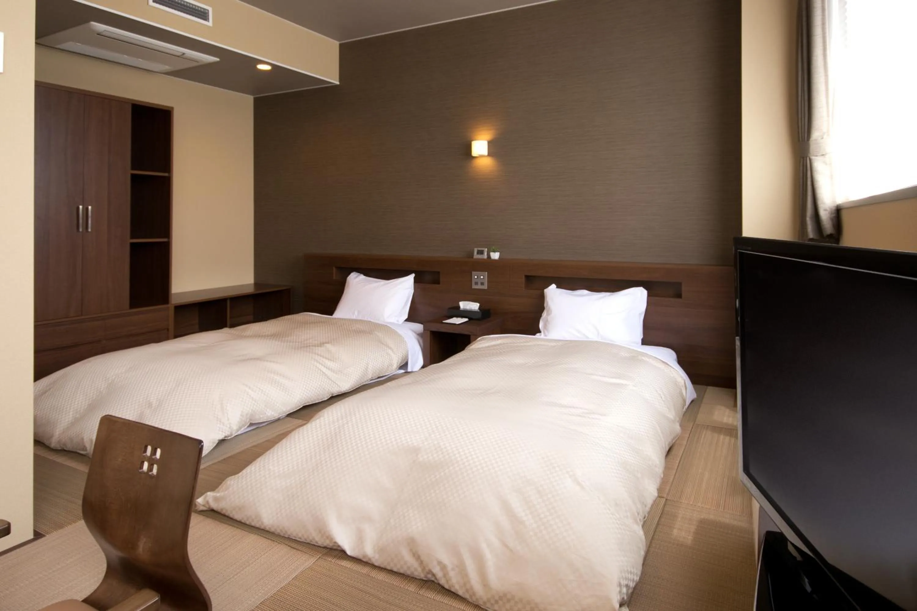 Bed in Hotel Futabatei