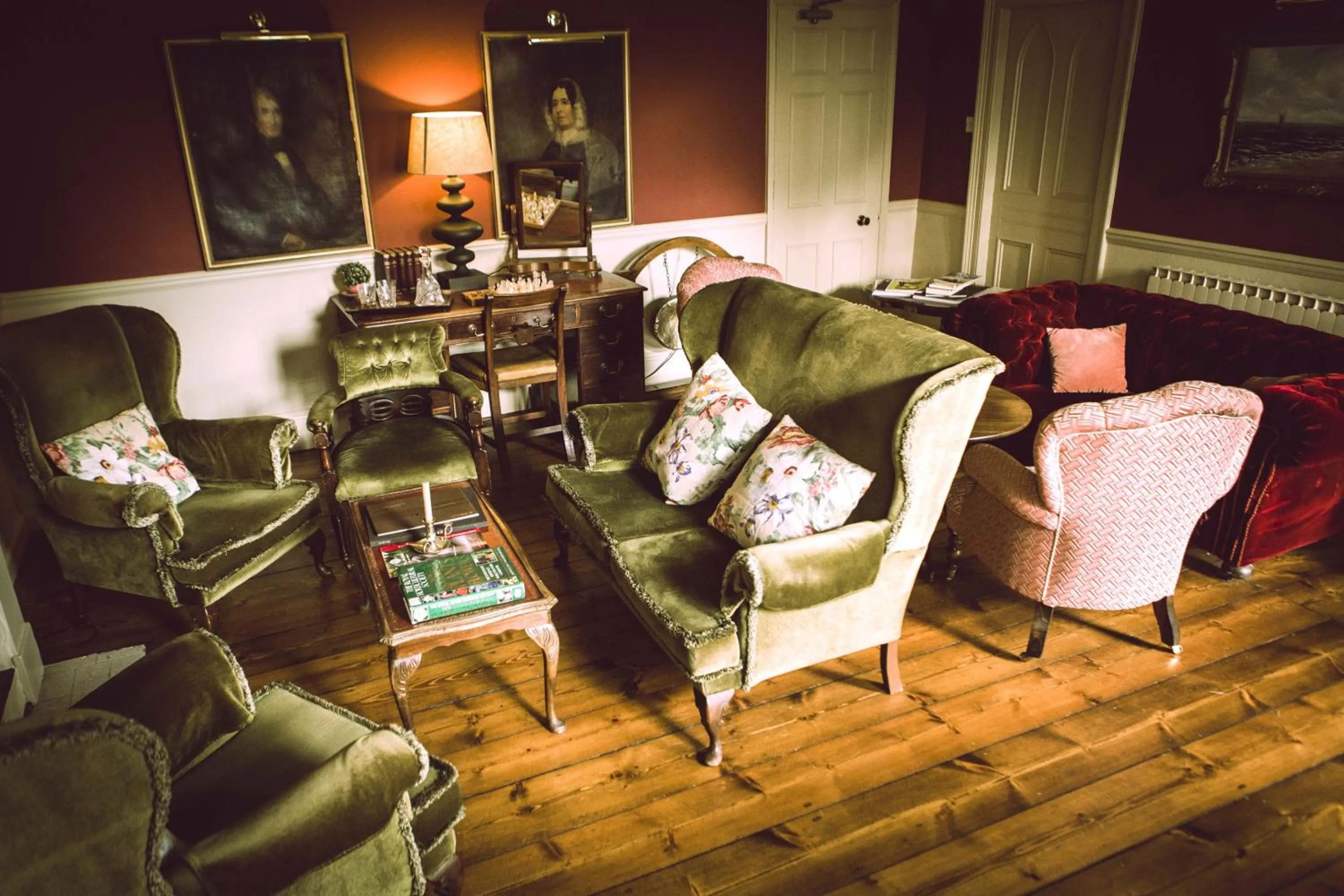 Communal lounge/ TV room in Les Douvres Hotel