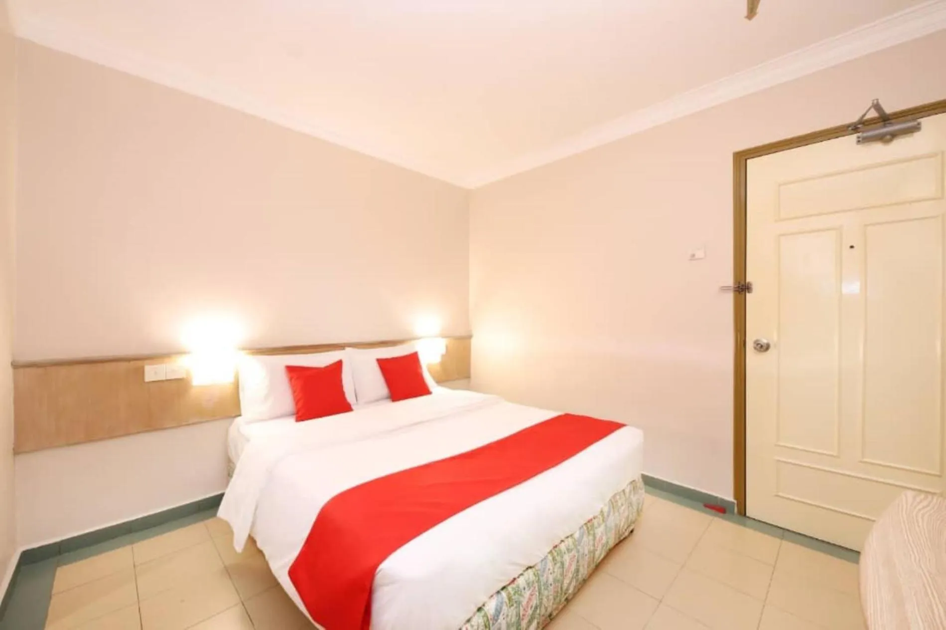 Bed in Famous Inn Hotel