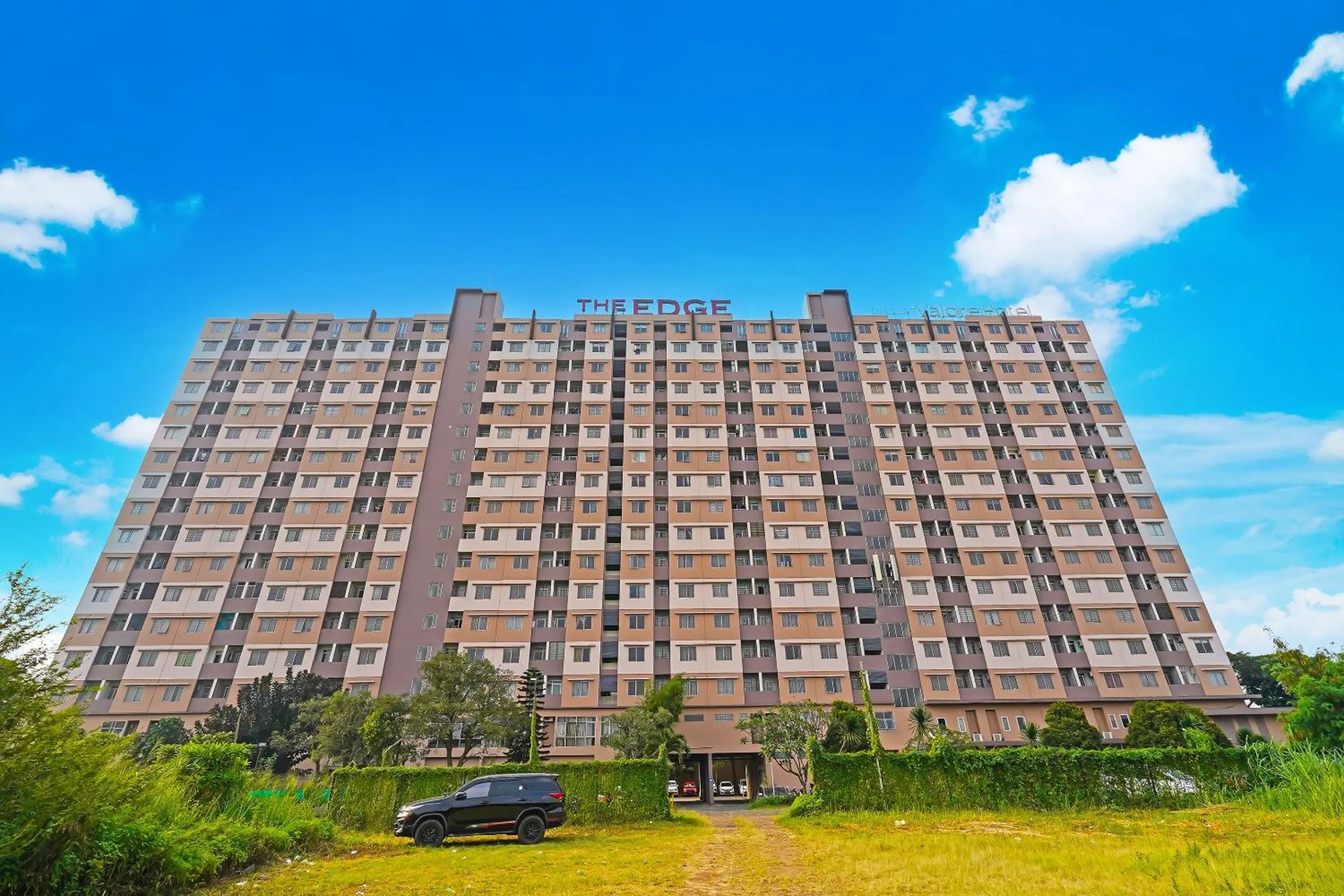 Facade/entrance in OYO Life 92774 The Edge Apartment By My Home