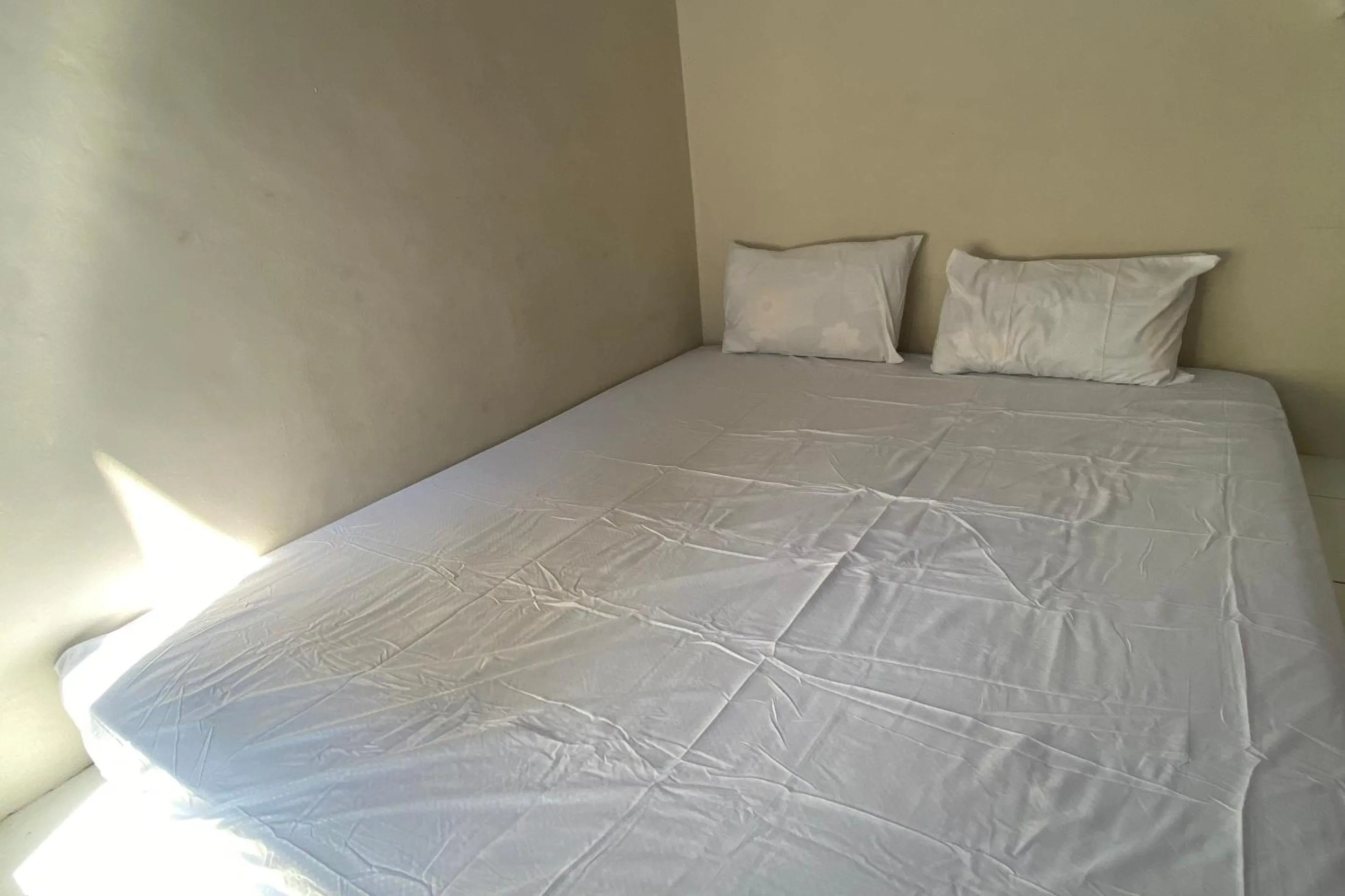 Bedroom, Bed in OYO Life Kos Bu Luh Mangku