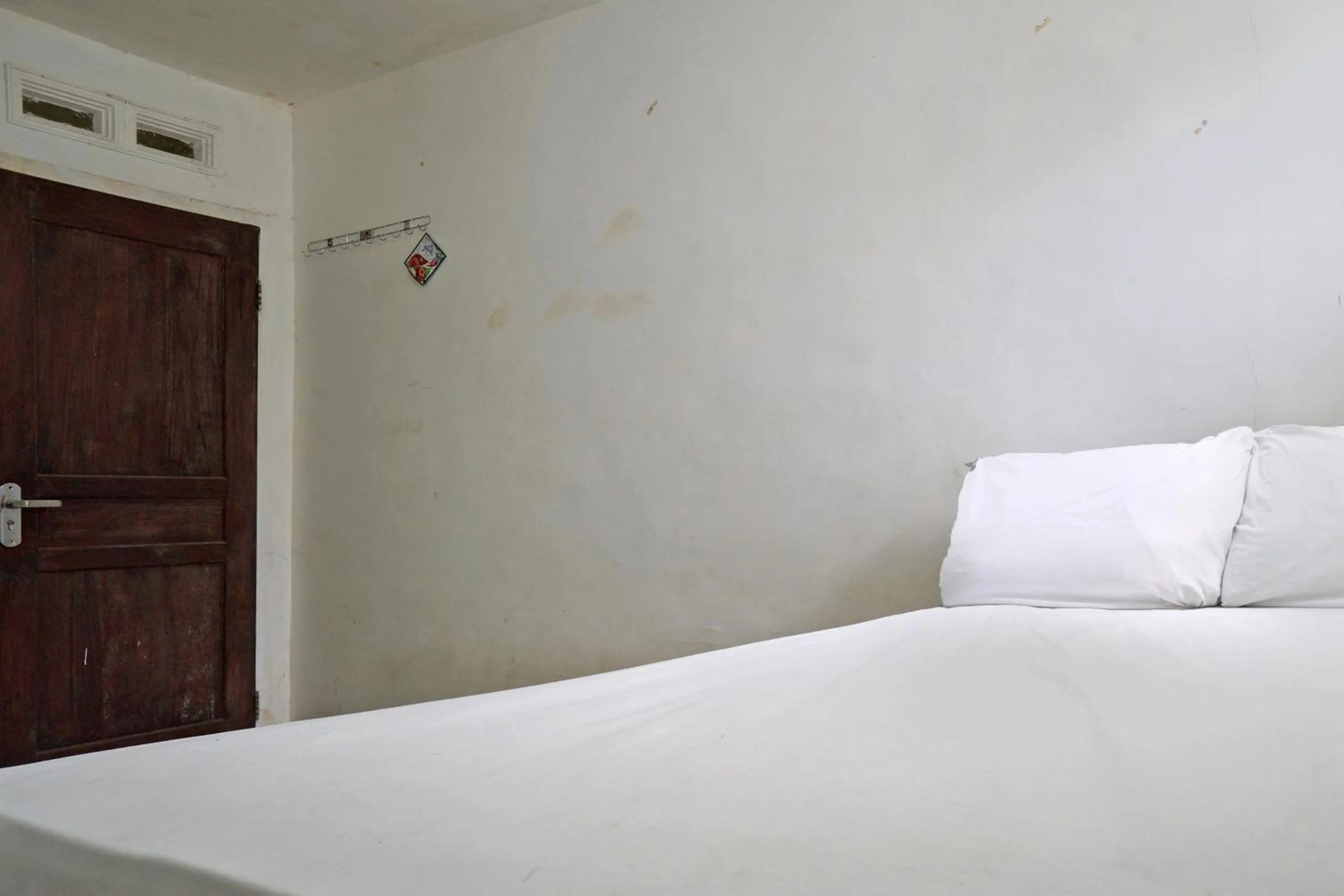 Bedroom, Bed in OYO Life 92919 Kost Wijaya Kusuma Lake Syariah