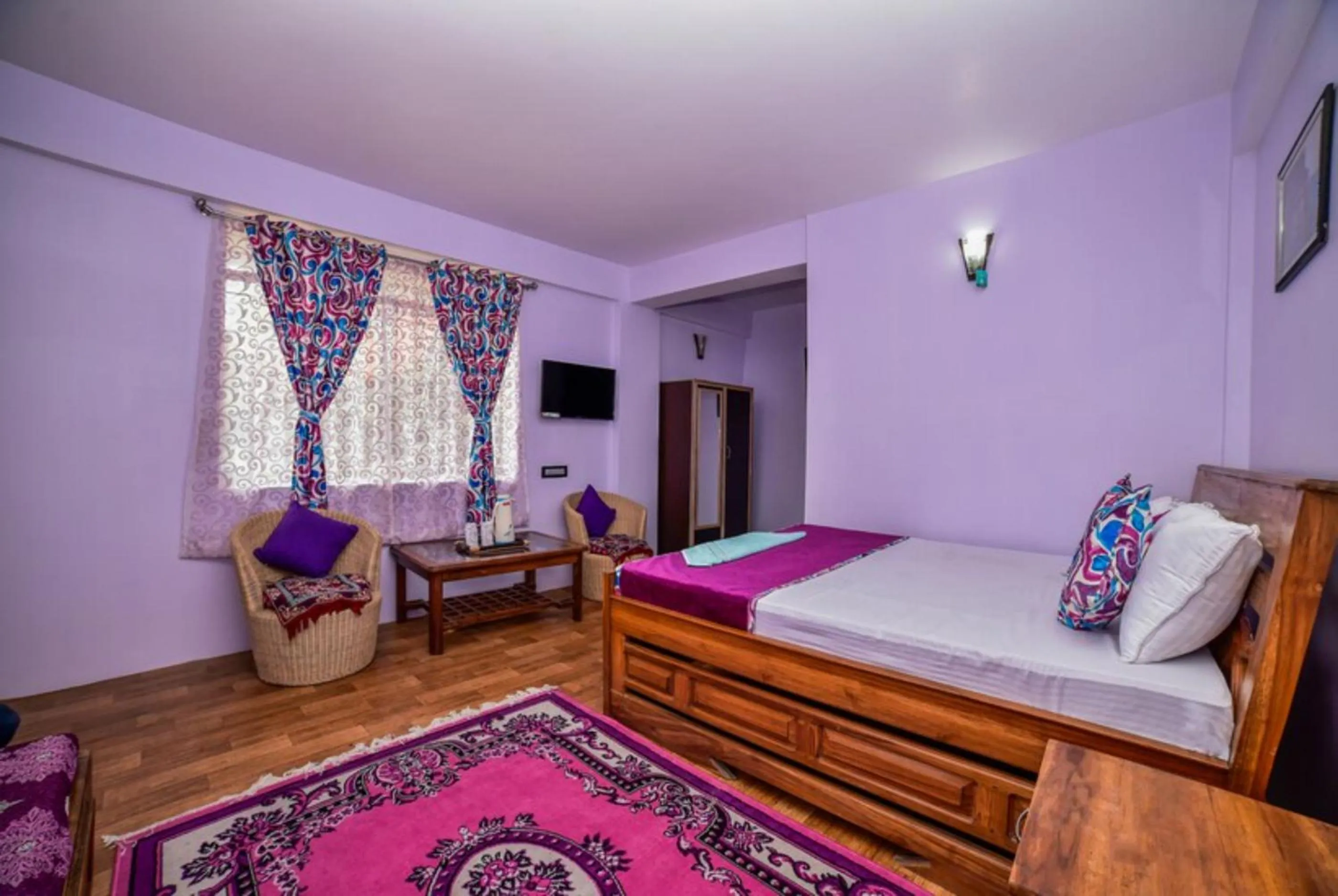 Bed in GRG Tharbaling Homestay Darjeeling