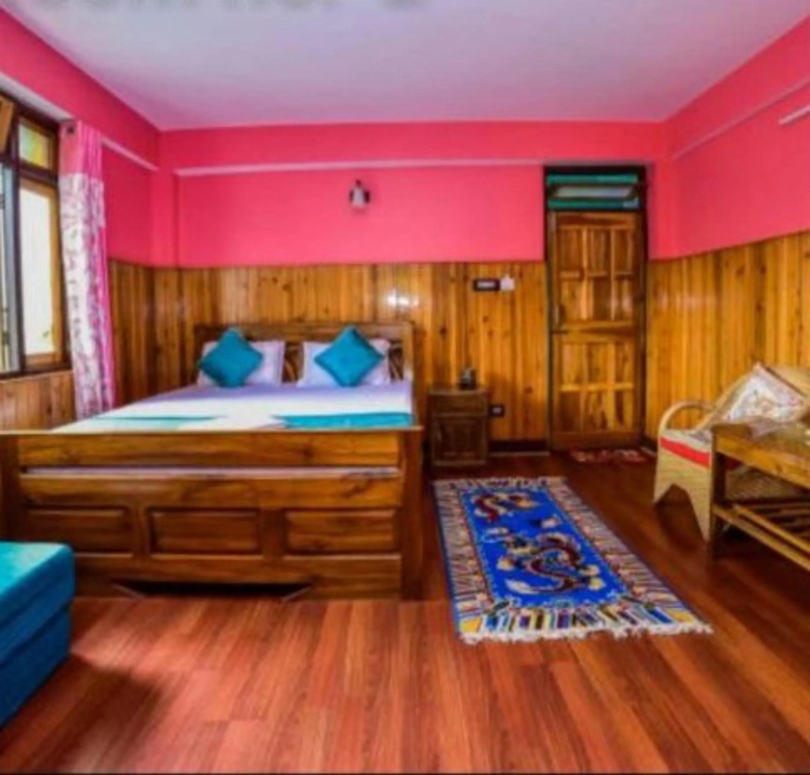 Bed in GRG Tharbaling Homestay Darjeeling