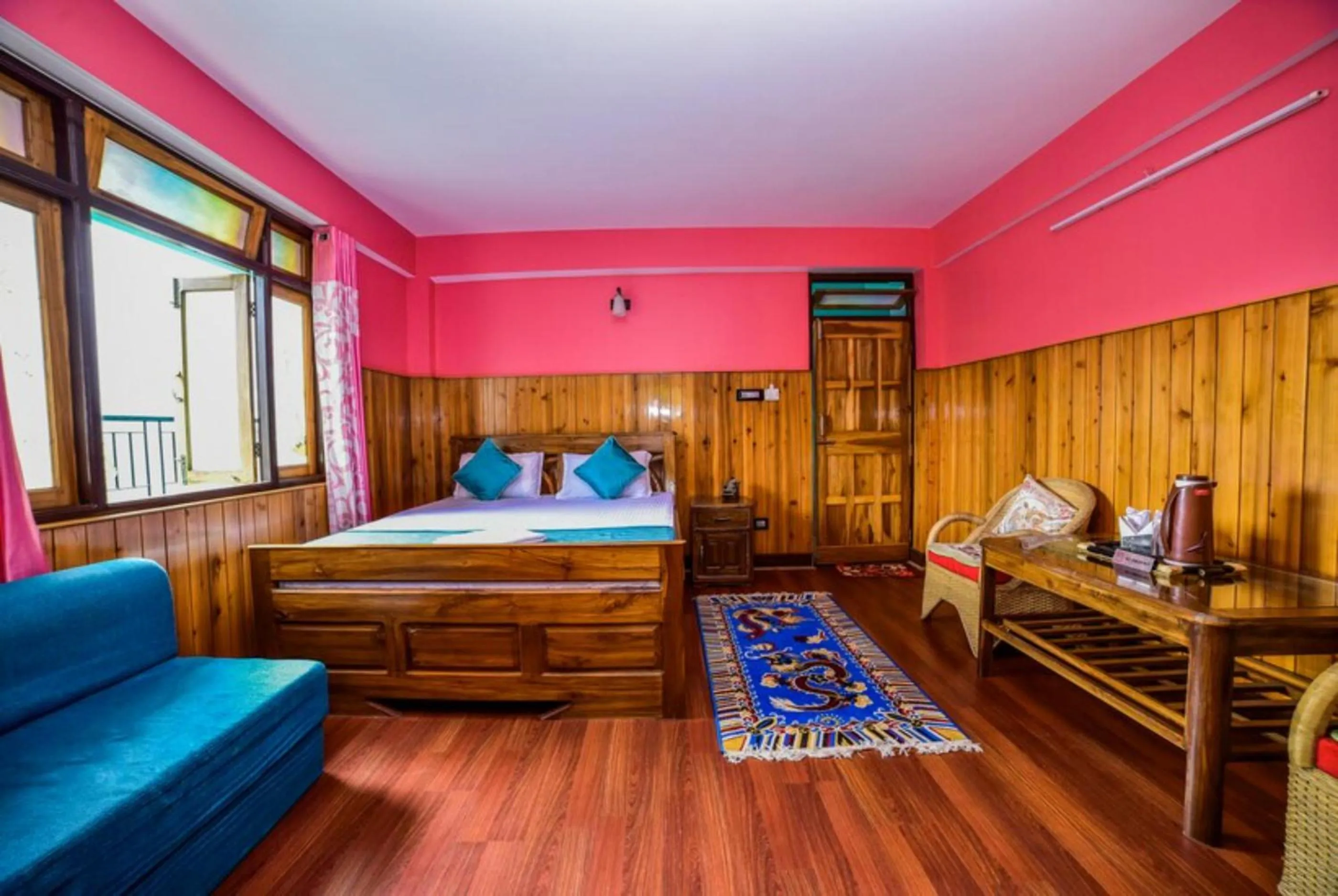 Bed in GRG Tharbaling Homestay Darjeeling