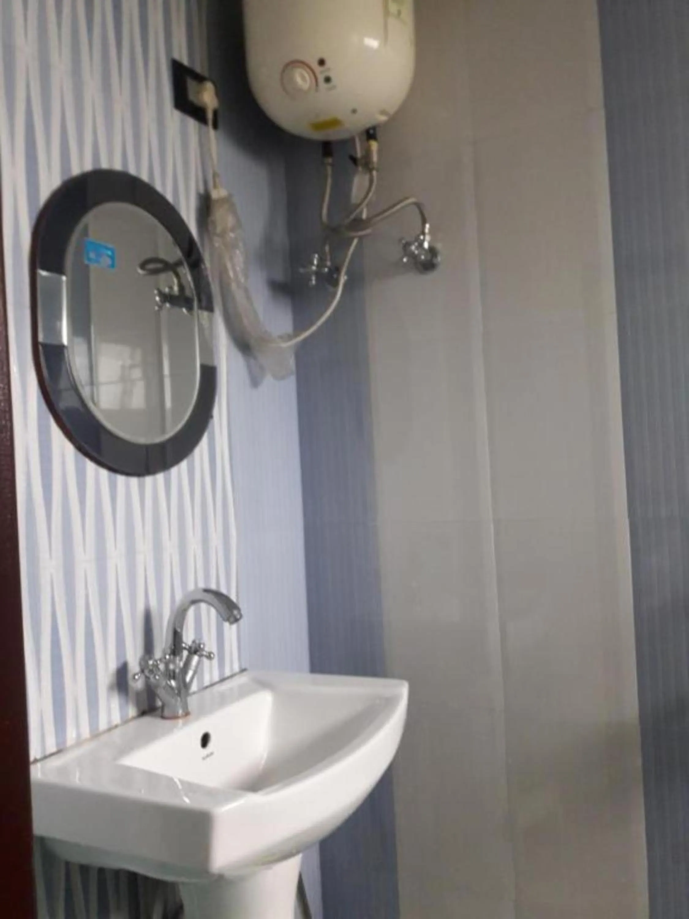 bidet in GRG Tharbaling Homestay Darjeeling