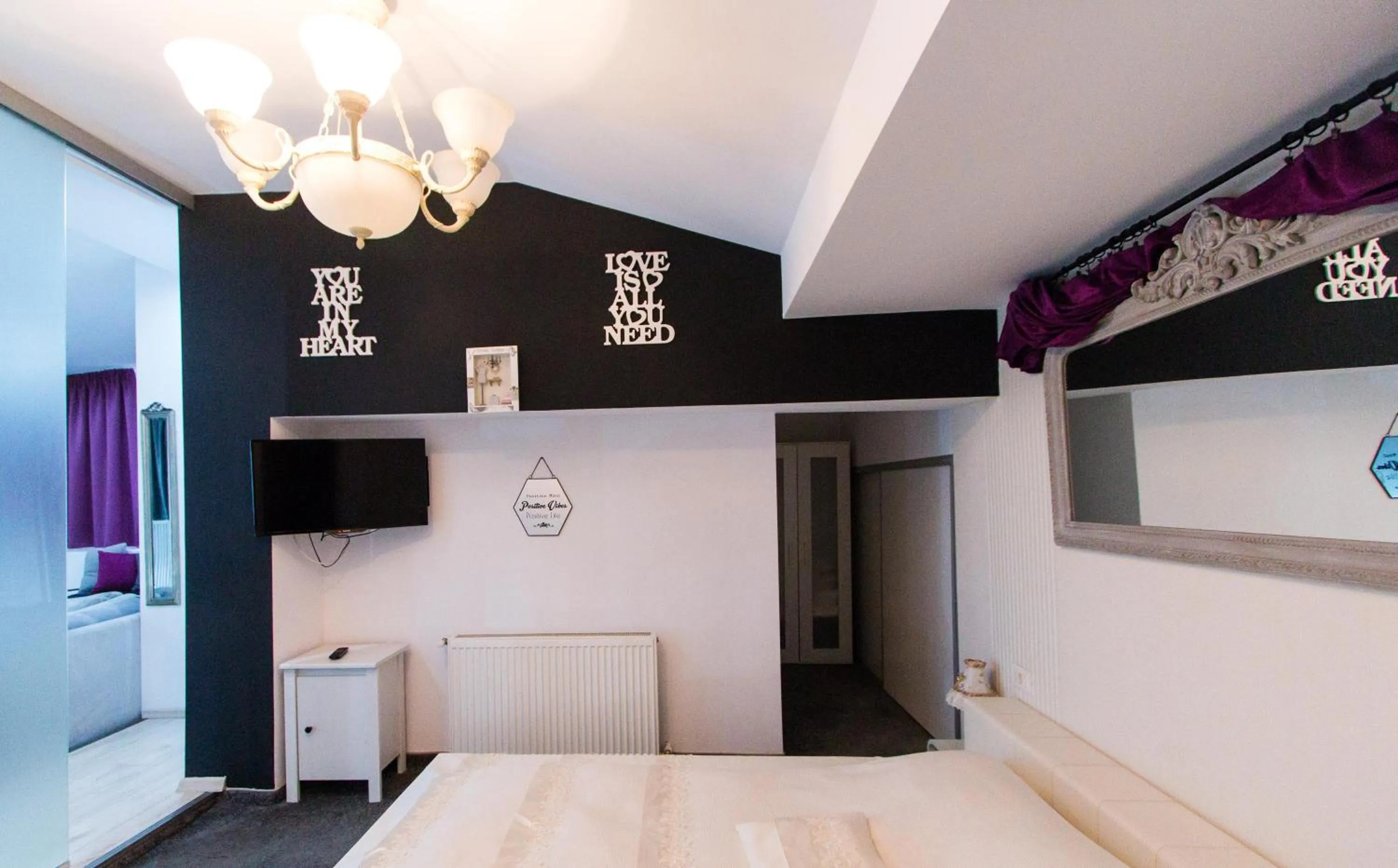 Bed in Hotel Jolie Apartments